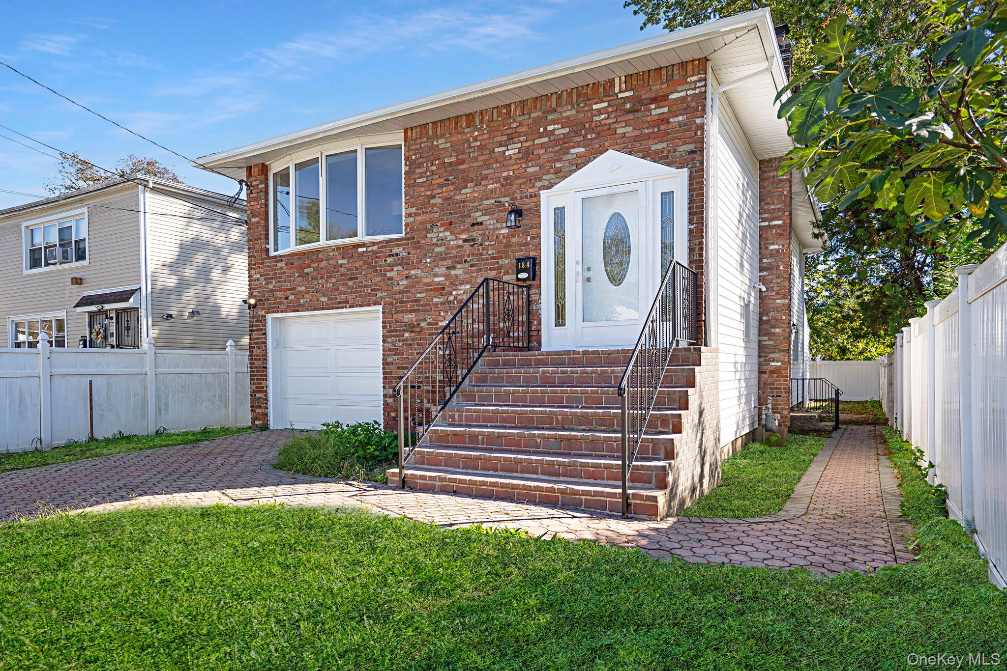Welcome to this beautifully remodeled 7-bedroom, 2-bath home located in the heart of Hempstead, NY. Perfect for a large or growing family, this spacious residence offers modern comfort and functionality throughout. With proper permits/approvals, this home can be adapted for two family use. The newly updated interior features a bright, open layout, a brand-new kitchen with contemporary finishes, and stylishly renovated bathrooms. Enjoy the convenience of in-home laundry and a large garage providing ample storage and parking space. With plenty of room for everyone and move in ready! Call today!