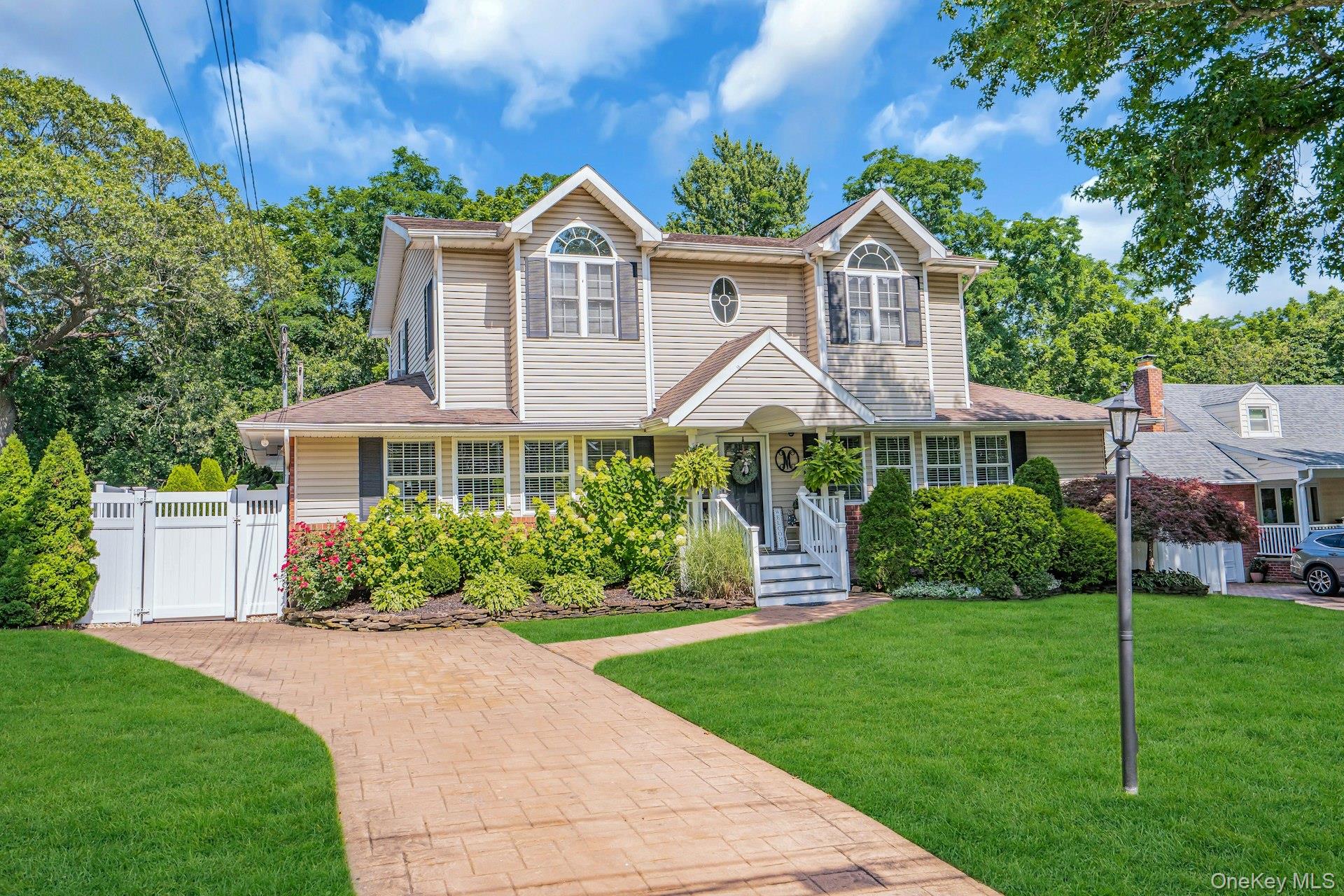 Curb Appeal! This house won&rsquo;t last. Beautifully renovated, roomy, open concept, 2280 sq. ft. colonial offers great entertainment space. Enter the home from the covered porch into the big, bright family room and over-sized dining room. Both rooms have nice chandeliers and lots of natural light form the double hung windows. The kitchen is in the back of the house overlooking the pool. The kitchen was updated 2 years ago and features white cabinets and stainless appliances. There is a small island with seating and a kitchen table area. For those that need a 1st floor bedroom and bathroom, this house has it! The primary bedroom is so pretty with cathedral ceilings and 2 walk-in-closets. The main bathroom has been updated so pretty. The other two bedrooms are also nice and one of them also has high ceilings and a big picture window. The basement is a nice size with a small den area and 3 separate rooms for activities. There is also a storage and utility room. The backyard has a patio, a shed and a really cute cabana. The salt-water pool features a diving board and the vinyl is only 4 years old and the filter and pump are 5 years old. Samsung dishwasher 1 year, Samsung refrigerator 1 year, Washer 7 years, Dryer 4 years, CAC 23 years, Air Handler 11 years, Cesspool has replaced plumbing and an additional tank 2008, 275 Gallon oil tank in basement, Generator (separate). Blinds and drapes stay.