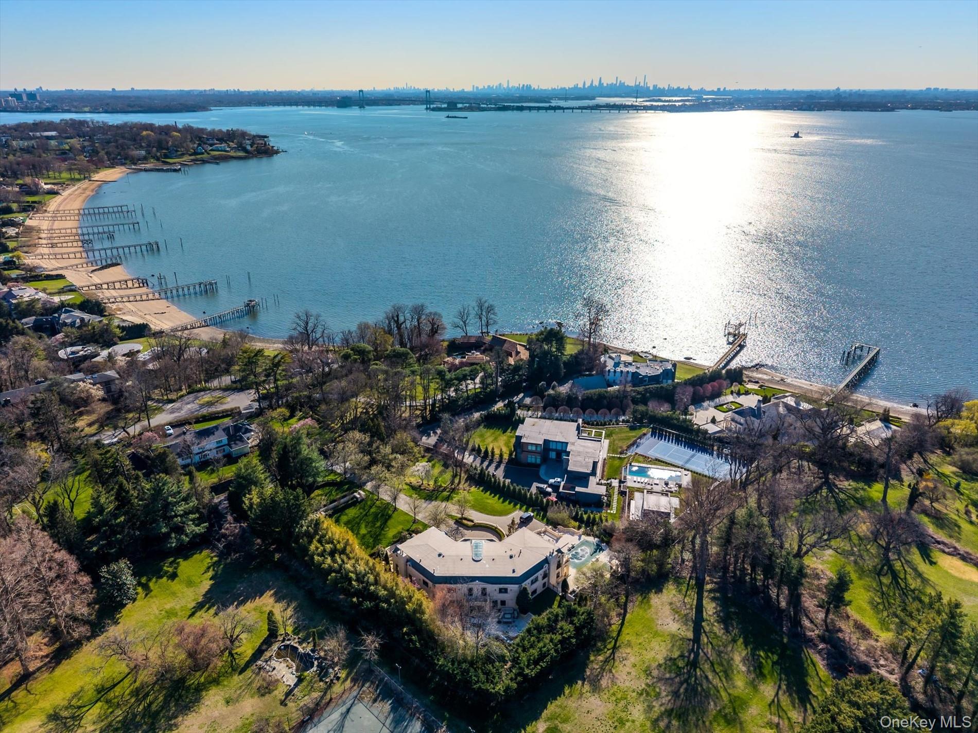 Luxurious Waterview Mansion in the Prestigious Village of Kings Point. Set on 1.4 acres of stunning water view property, this magnificent Estate offers the ultimate in luxury living, both indoors and out. Nestled in the heart of the sought-after Village of Kings Point, this grand residence combines timeless elegance with resort-style amenities for year-round enjoyment. The double height entry foyer leads you to the grand ornate ball room style living room, formal dining room, and a spacious den ideal for hosting and everyday living. The Eat-in-kitchen offers custom cabinetry, premium appliances, and generous workspace perfect for culinary creations. The second floor features the primary suite with sitting room, spa-like bath, and spacious dressing room plus Three Additional Bedrooms, each with en-suite baths and a bonus Den/Office with its own full bath for added flexibility. The lower level retreat welcomes you to an Indoor Swimming Pool with Steam Room and Sauna, Movie Theatre, Stylish Bar and Private Gym and an additional Bedroom with Full Bath. The outdoor oasis includes an Inground Pool surrounded by lush landscaping multiple decks and sitting areas with tranquil views of Manhattan and the bridges and glorious sunsets, perfect for entertaining or peaceful relaxation. This exceptional Kings Point Estate offers a rare combination of space, elegance, and top-tier amenities in one of Long Islandâ€™s most coveted locations.