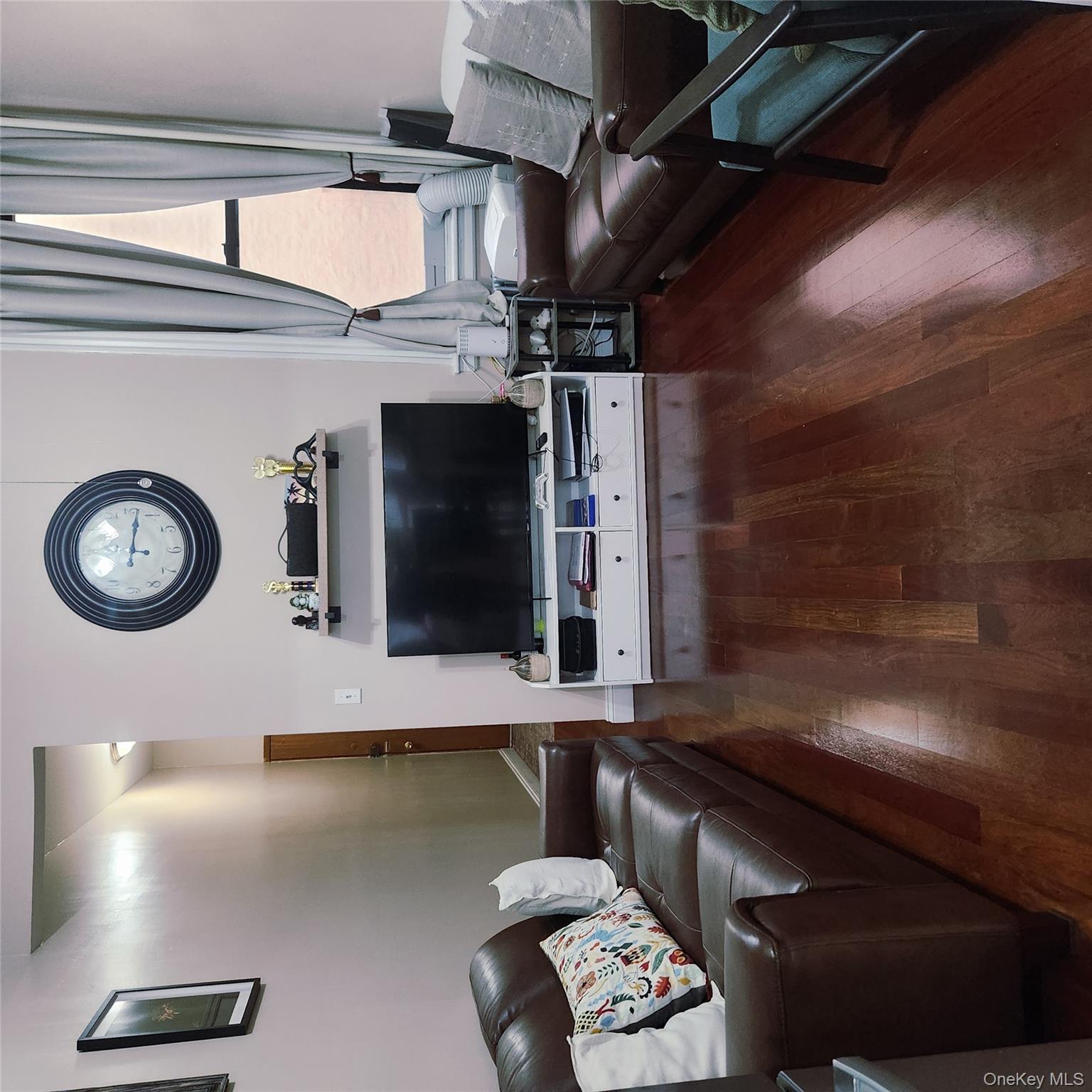 6 Family brick building, owner occupied, clean & well maintained. Each apartment has large eat-in kitchen (EIK), LR, full bath and two bedrooms. Full, open, unfinished basement, gas heat and hot water. New roof and hot water heater. Updated kitchens and baths with automated utilities. One apartment delivered VACANT on closing. Backyard includes a garden area. Short distance to parks, shops, trains and buses. Desirable property in Ridgewood for renters and owners/investors alike.