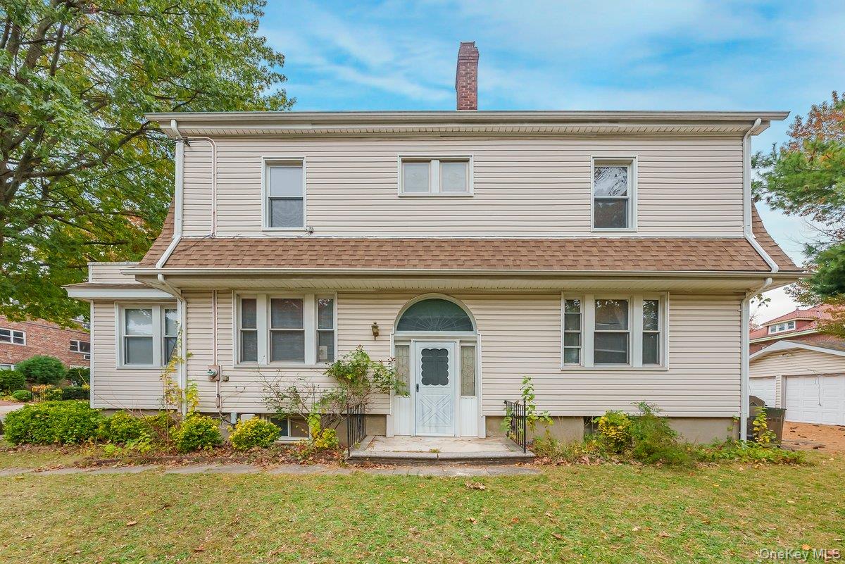 True pride of ownership on display here, nestled away in the highly desirable Woodlawn section of the Bronx, just 25 minutes north of Manhattan, this wonderful 4-bedroom, 2.5-bath Colonial blends timeless charm with modern comfort. Perfectly situated on a beautifully landscaped lot, the property features your own long private driveway and a detached two-car garage, offering both privacy and convenience. Step inside through a welcoming entry foyer that opens to an expansive, sun-filled living room and a formal dining roomâ€”perfect for gatherings and entertaining. A bright sunroom provides a versatile space ideal for a home office, reading nook, or family room. The first floor is completed by a spacious kitchen and a tasteful powder room. Richly finished hardwood floors, detailed moldings, and classic architectural touches flow throughout, creating an inviting and elegant ambiance. Upstairs, the serene primary bedroom is complemented by three additional bedrooms and a beautifully maintained hall bath, along with generous closet space throughout. The finished third level offers two additional rooms and a full bathâ€”perfect for use as guest quarters, a home office suite, or a creative studio. The lower level adds even more versatility, featuring space for a recreation or family room, along with laundry and utility areas. Step outside to your private backyard oasisâ€”ideal for relaxing, gardening, or entertaining family and friends. A true commuterâ€™s dream, this residence is just minutes from Metro-North trains, local and express buses, Van Cortlandt Park, shopping, dining, and major parkways. Offering the perfect balance of suburban comfort and city accessibilityâ€”with exceptionally low taxes and access to excellent public schoolsâ€”this Woodlawn gem is the perfect place to call home.