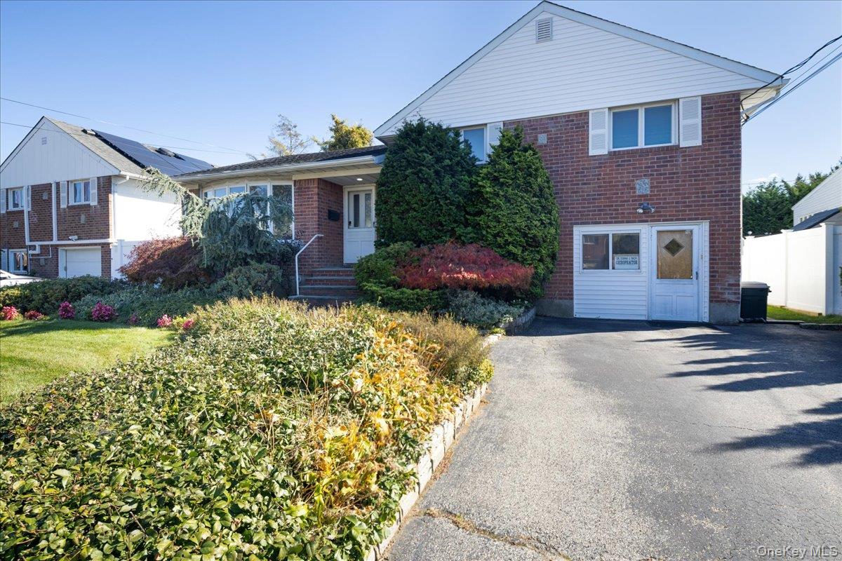 Welcome home to this great opportunity, a lovely 3 Bedroom 2.5 bath split in the Heart of East Meadow with a fully legalized 4-room home office complete with a waiting room. This is the ideal setup for any Attorney, Accountant, or medical professional. The residence features a large Living Room, Dining Area, eat-in Kitchen, Full Unfinished Basement, recently updated Deck, complete with a Brand New Retractable Awning. Located on a quiet street close to Parks, Schools, Shopping, & Much More.