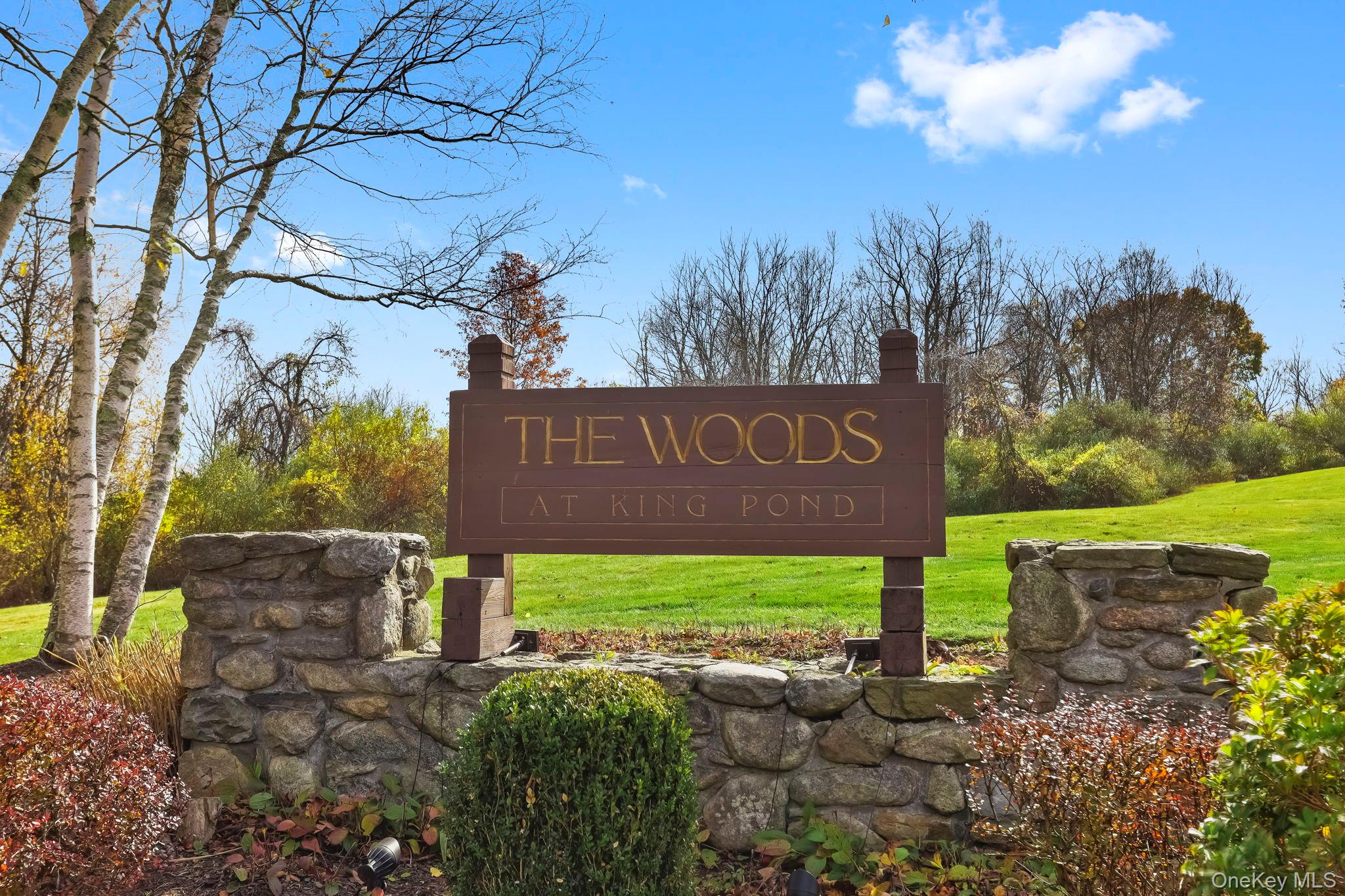 Welcome to The Woods at Kingâ€™s Pond!This 1, 418 sq. ft. two-bedroom condo in the heart of Mahopac, offers comfort, convenience, and a warm sense of home from the moment you walk in.Step inside to a two-story entryway with tile flooring that opens to a bright and airy living space. The living room features cathedral ceilings with fireplace and flows seamlessly into the dining roomâ€”both highlighted by pre-finished hardwood floors. The eat-in kitchen provides plenty of space for morning coffee or casual meals, with easy access to the main living areas as well as the attached garage. The primary bedroom suite includes its own full bath, creating a private retreat. A second spacious bedroom and an additional full bath make this home perfect for guests, a home office, or family. This condo offers the perfect blend of style, comfort, and low-maintenance living. Taxes do not include STAR deduction $882.00