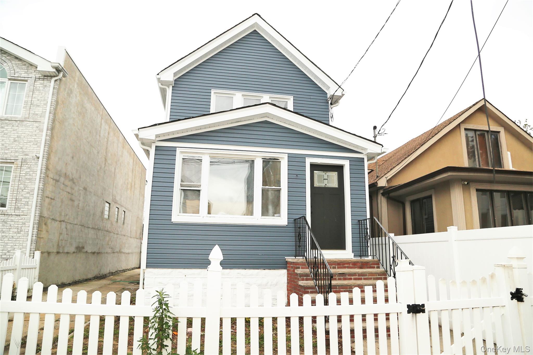 Welcome to 13416 221st Street, a beautifully fully renovated Two-family home in the heart of Laurelton, Queens. This modern residence offers four spacious bedrooms, a bright open-concept living and kitchen featuring custom cabinetry, quartz countertops, and stainless steel appliances. The home includes a fully finished basement two bedrooms with a separate entrance,  Private driveway providing convenient off-street parking and Detached one car Garage. With its stylish finishes, updated systems, and prime location close to schools, shopping, and transportation, this move-in-ready home delivers exceptional comfort and value.