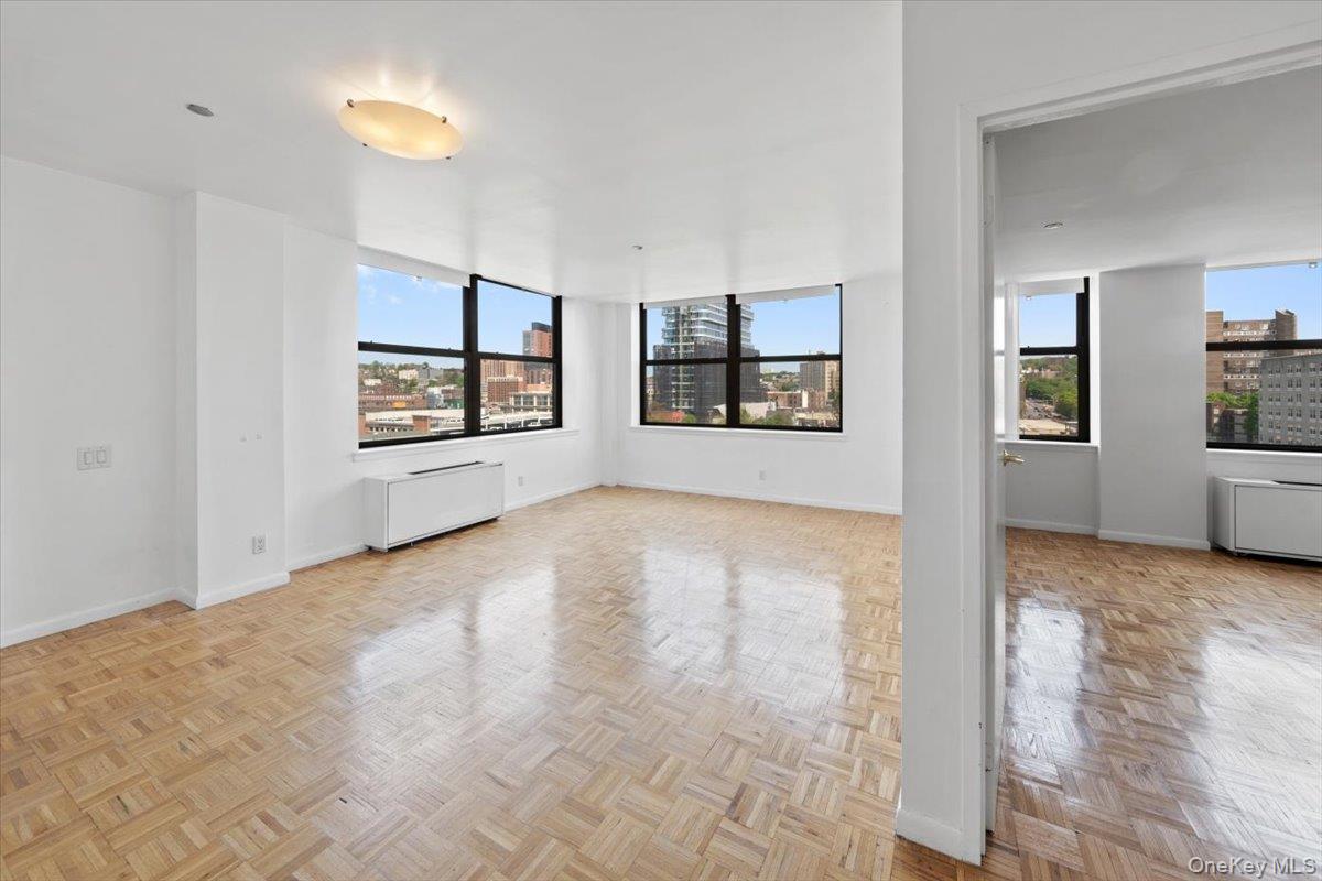 CITY VIEW FROM EVERY ROOM  Enjoy Refined Living in this Bright One Bedroom Corner Condo Located in the Heart of Hollywood on the Hudson  Kitchen Offers Plenty of Cabinet and Counter Space, Highlighted by Downtown Views  Spacious Dining / Living Area Provides the Same Beautiful City Backdrop, Ideal for Relaxing or Entertaining  Bedroom Features Generous Closet Space, Including a Double Closet and an Open Wardrobe Area, all while Showcasing Downtown Views  Updated Bathroom Includes Sleek Tile Finishes and Glass Shower Doors for a Modern, Contemporary Design  As a Corner Unit, this Condo is Filled with Natural Light throughout the Day  Building Amenities include a 24-Hour Concierge, Fitness Center, and On-Site Laundry Facilities  Conveniently Located Near the Metro-North Hudson Line for a Quick 30-Minute Commute to Grand Central Station  Enjoy Nearby Esplanade Park, Restaurants, Shops, and Lionsgate Movie Studio  Take in the Best of Waterfront Living with Kayaking, Entertainment, and Peaceful Moments on the Hudson River Boardwalk  Note: Some Photos are Virtually Staged