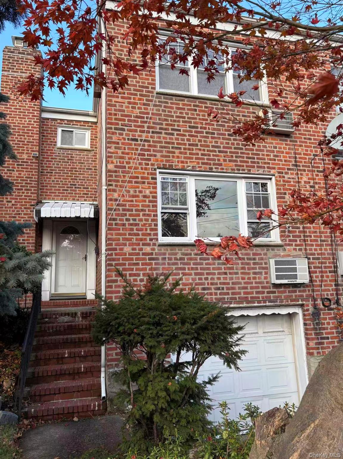 Welcome to this charming and well-maintained semi-attached single-family home located in the heart of Bayside. Offering approximately 1, 950 sq ft of comfortable living space on a 2, 017 sq ft lot, this residence features a bright and functional layout with 3 spacious bedrooms and 2 full bathrooms. The main level provides an inviting living room, formal dining area, and a well-proportioned kitchen, while the full basement adds valuable storage and potential for additional recreation space. Enjoy a private backyard perfect for outdoor gatherings, gardening, or relaxation, plus the convenience of a private driveway and garage. With a solid masonry exterior and classic architectural charm, the home provides long-lasting durability and low-maintenance appeal. Ideally situated on a quiet, tree-lined street close to shopping, restaurants, parks, and transportation. Minutes to the LIRR, major roadways, and sought-after Bayside schools. An excellent opportunity for end-users or investors looking for a quality home in one of Queensâ€™ most desirable neighborhoods.