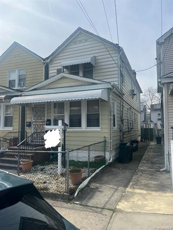 2 Family Home, 5 Bedrooms, 3 Full Bath. Conveniently Located! Needs work!