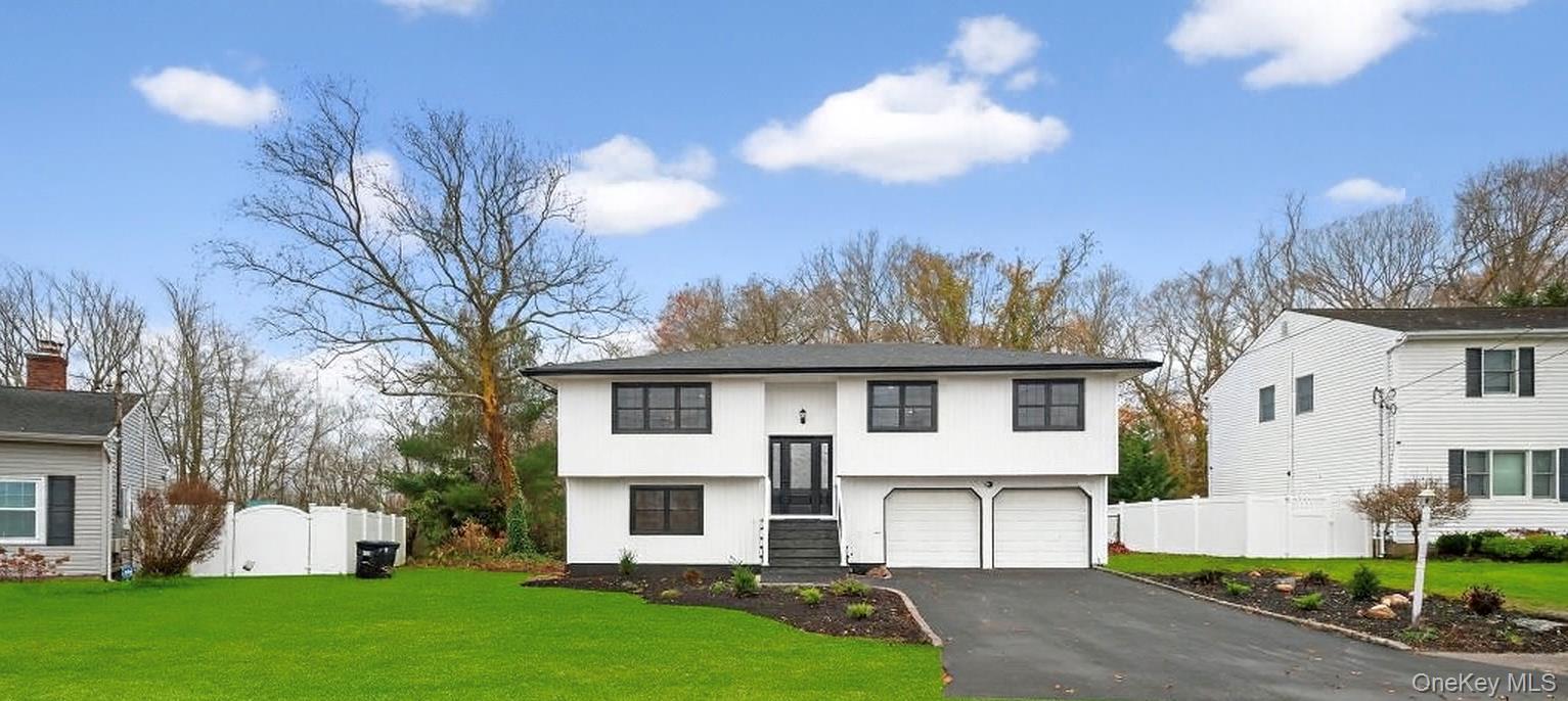 Welcome Home! All NEW Stunning And Tastefully Done Hi-Ranch in Sayville Schools District . Open Floor plan , 4 beds, 2 Full baths, Living Room , Dining, EIK with Quartz Center Island, Custom Cabinets, All New Kitchen Appliances, Baths with Quartz Flooring, Wood Floors, All New Windows, Roof, Central Air,  Hardy Board Exterior, Custom PVC Decking and Patio, 1St floor bedroom with living room, full bath, Sliders out to patio and backyard, Laundry, Room for Mom , 2 Car Garage,  Driveway. Close to Sayville Parks, Private Beaches & Ferries. This Home Will Not Last , Easy and Ready To Show.