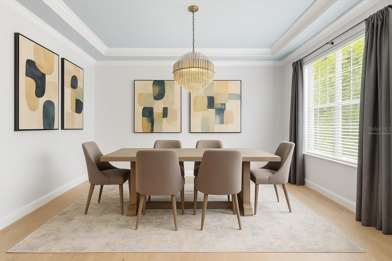 Dining area, or use as an office; as you walk in to the right of main entrance with modern luxury furnishings and virtually staged
