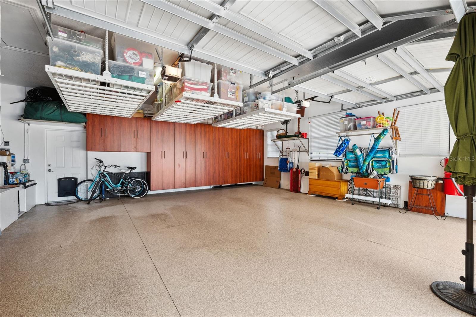 700SF garage with epoxy floors and tremendous storage!