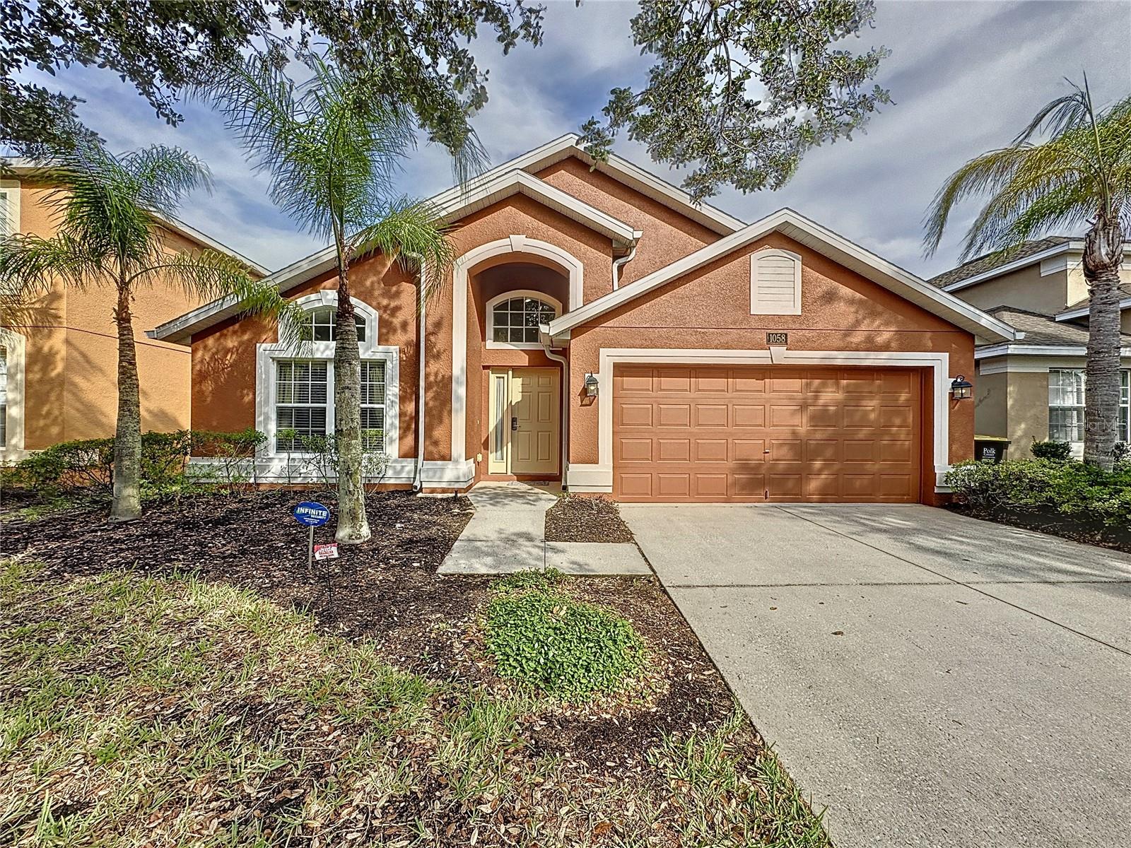 1058 ORANGE COSMOS BLVD, DAVENPORT, FL, 33837