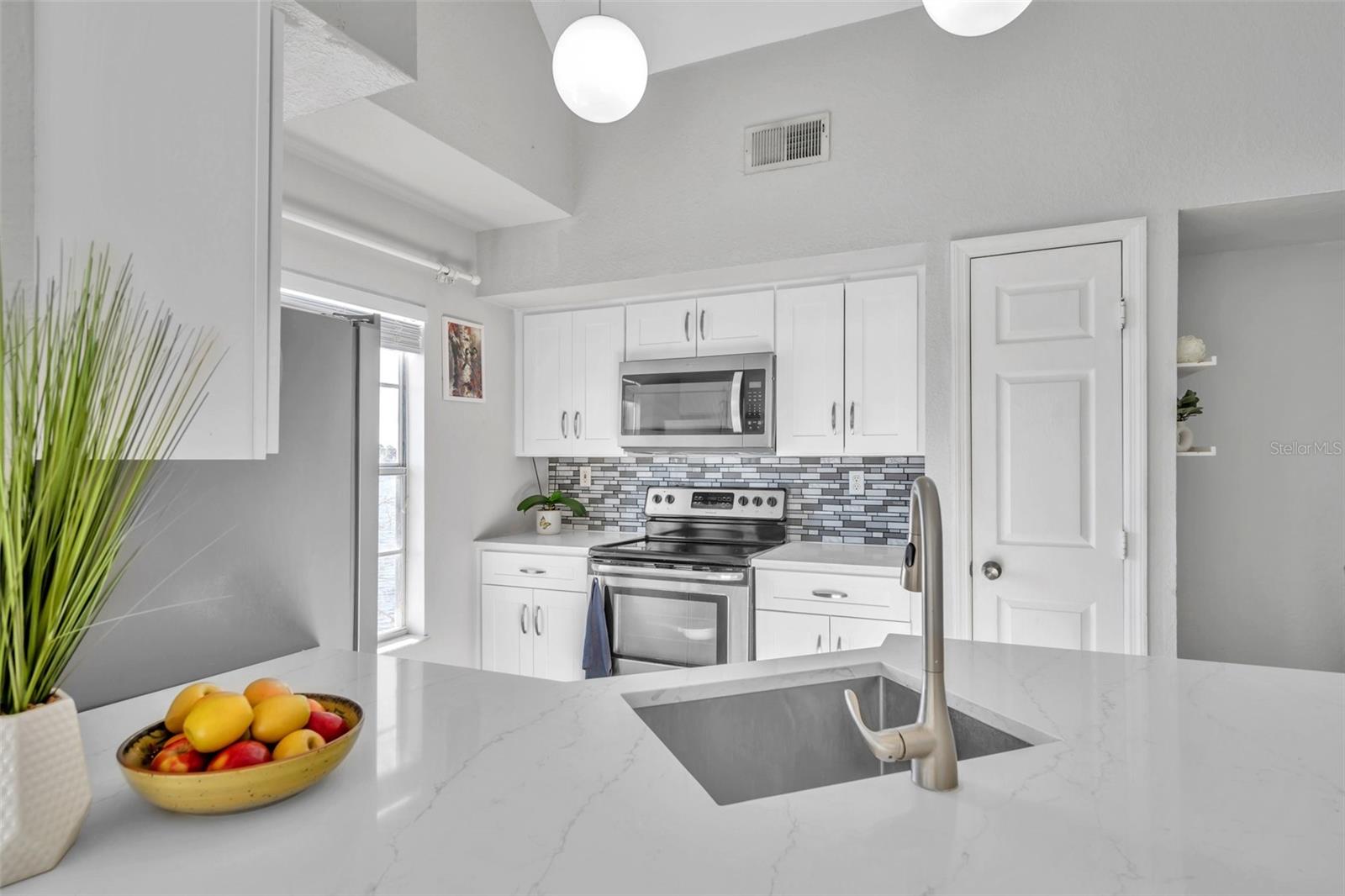 9036 LAKE CHASE ISLAND WAY #9036, TAMPA, FL, 33626