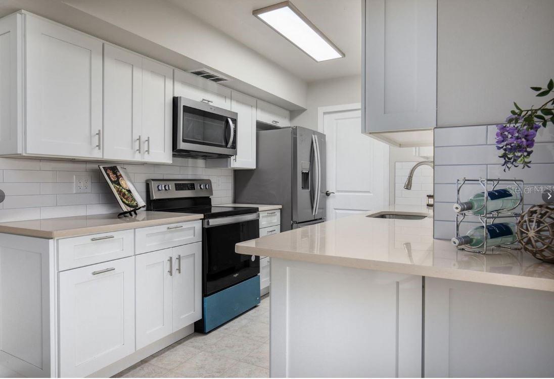 10355 PARADISE BLVD #211, TREASURE ISLAND, FL, 33706