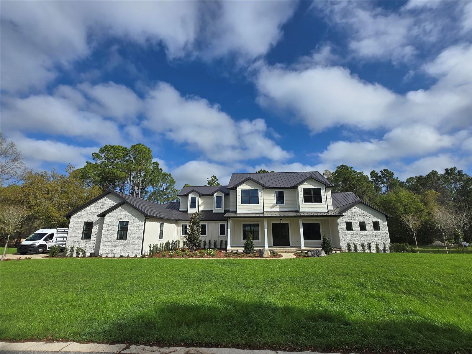 405 LONG AND WINDING RD, HOWEY IN THE HILLS, FL, 34737