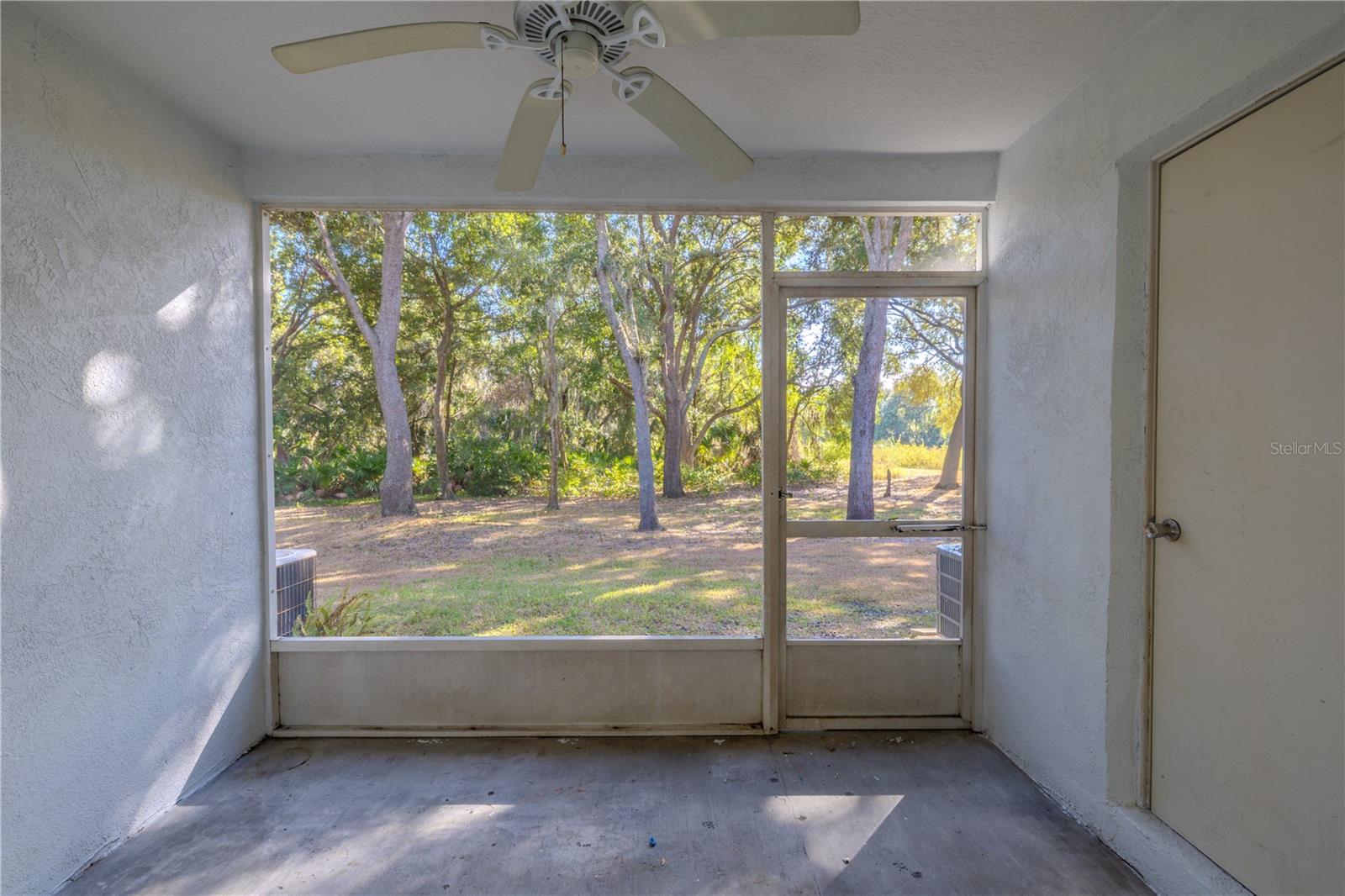 The private screened in porch has additional storage.