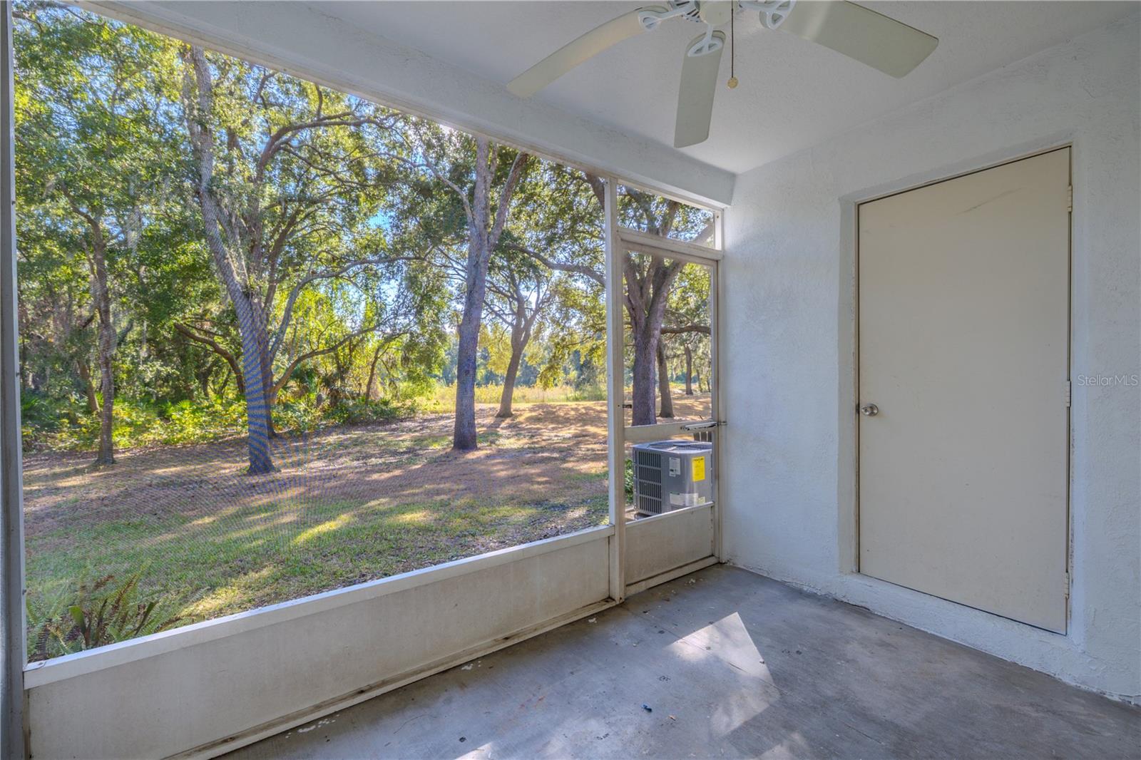 The private screened in porch has additional storage.