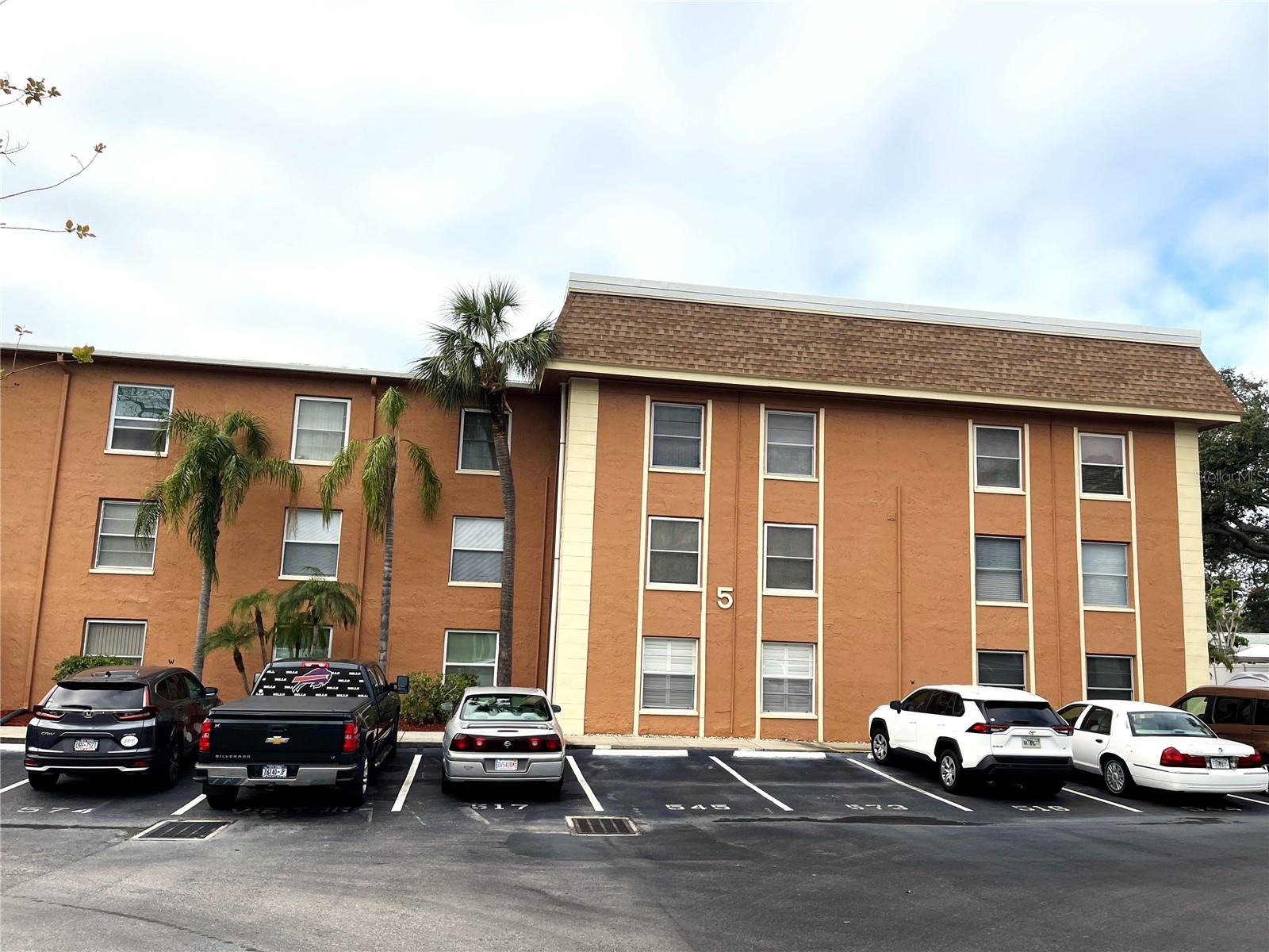 park in back of building, enter thru center to elevator