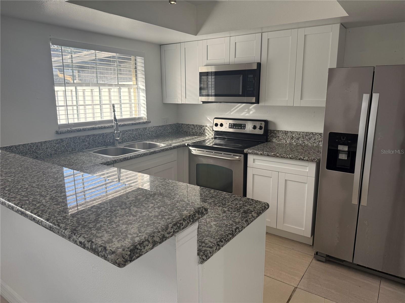 7638 WOODBRIDGE BLVD, TAMPA, FL, 33615