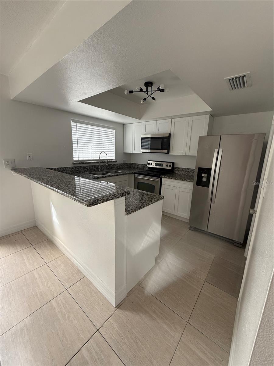 7638 WOODBRIDGE BLVD, TAMPA, FL, 33615
