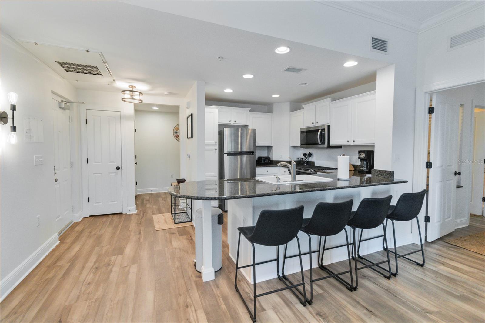 7703 HERITAGE CROSSING WAY #301, REUNION, FL, 34747