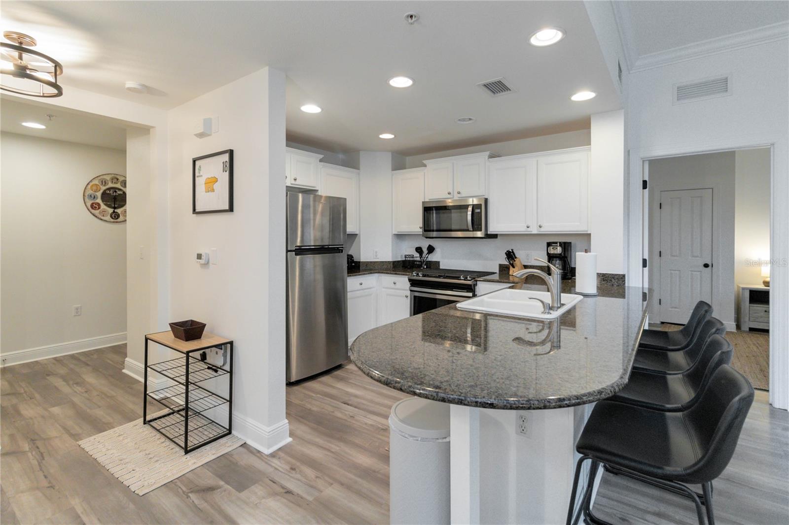 7703 HERITAGE CROSSING WAY #301, REUNION, FL, 34747