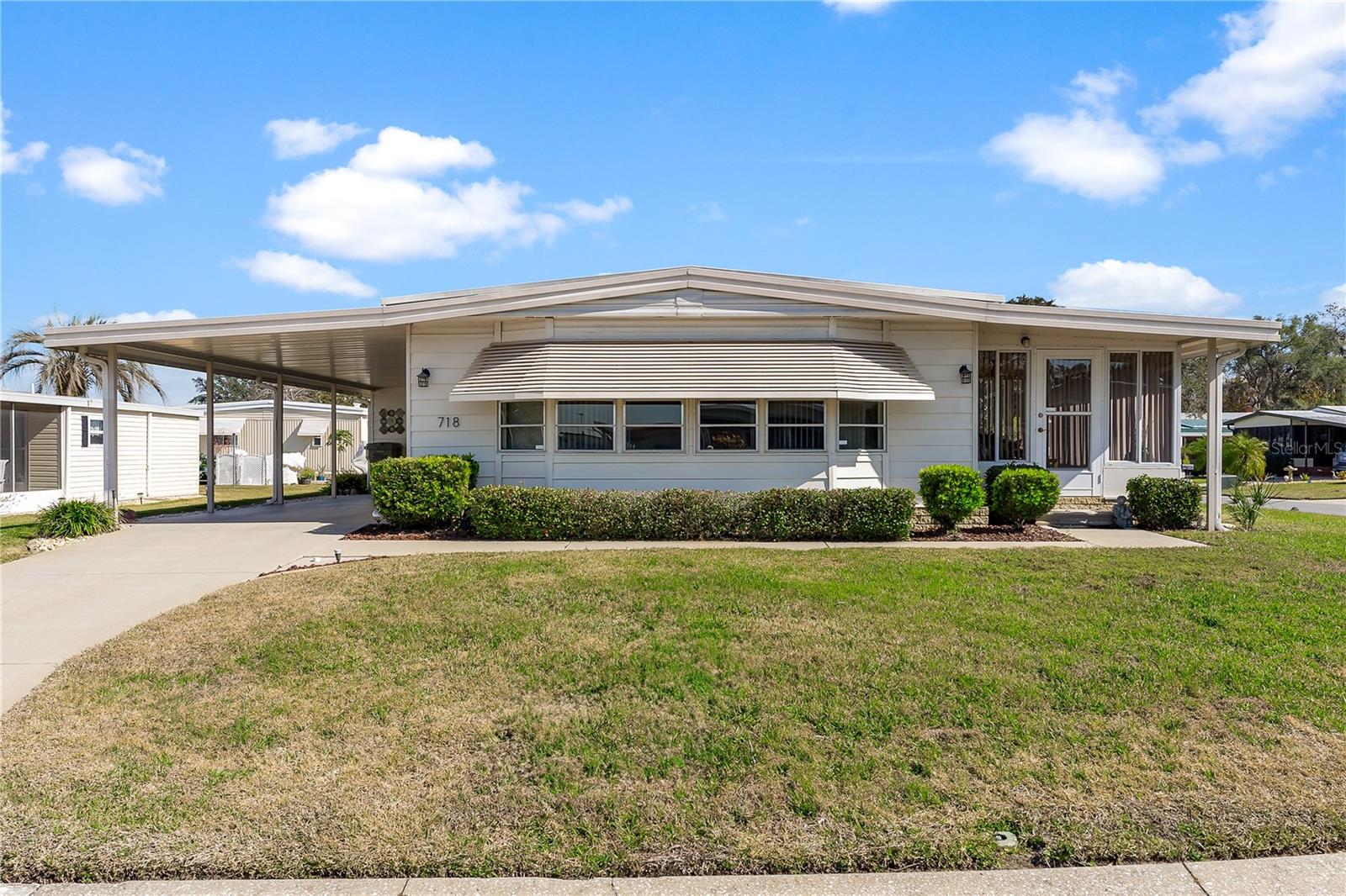 718 W COACH N FOUR DR, LEESBURG, FL, 34748