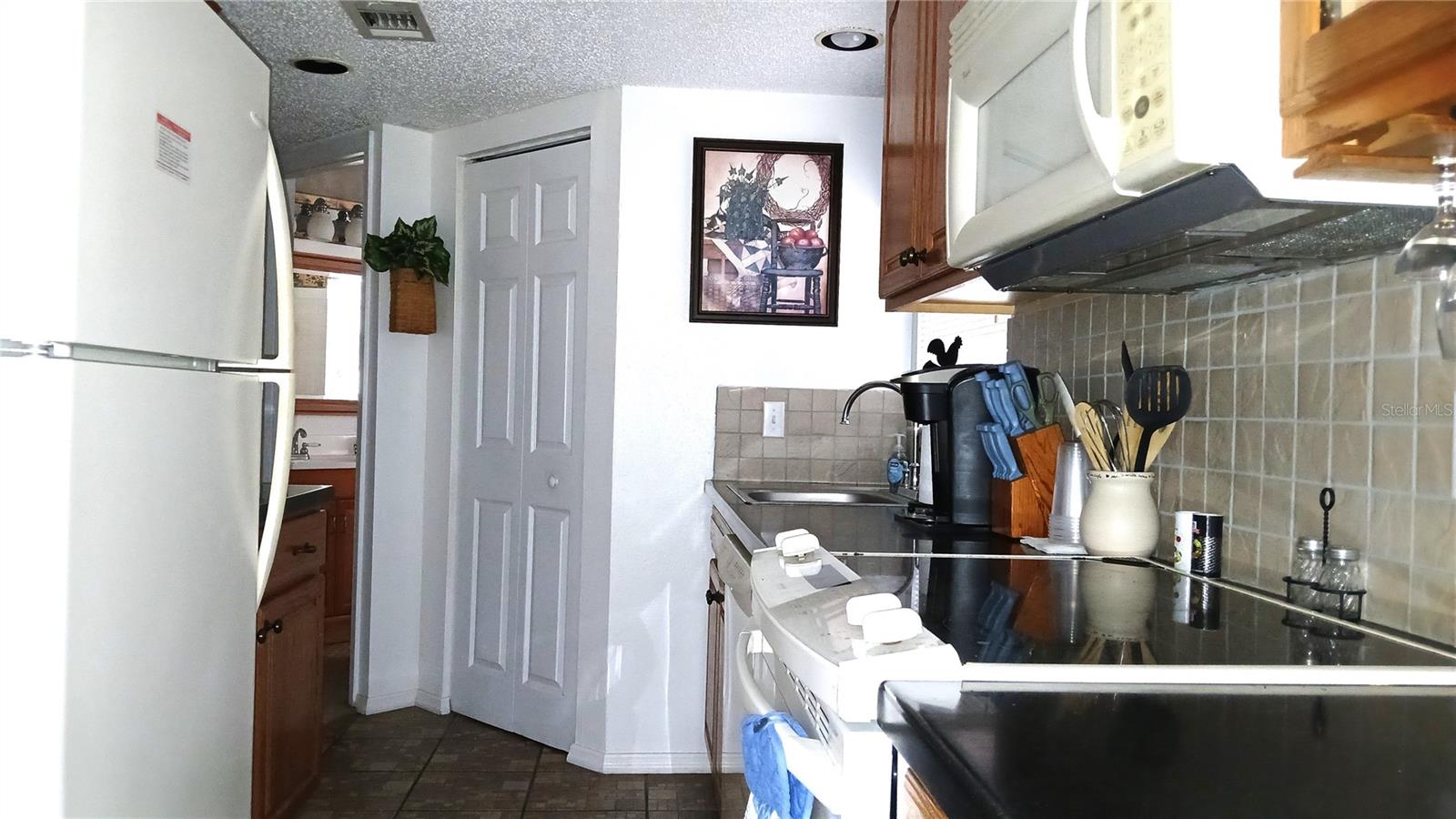 7990 MIDWAY DRIVE TER #M102, OCALA, FL, 34472