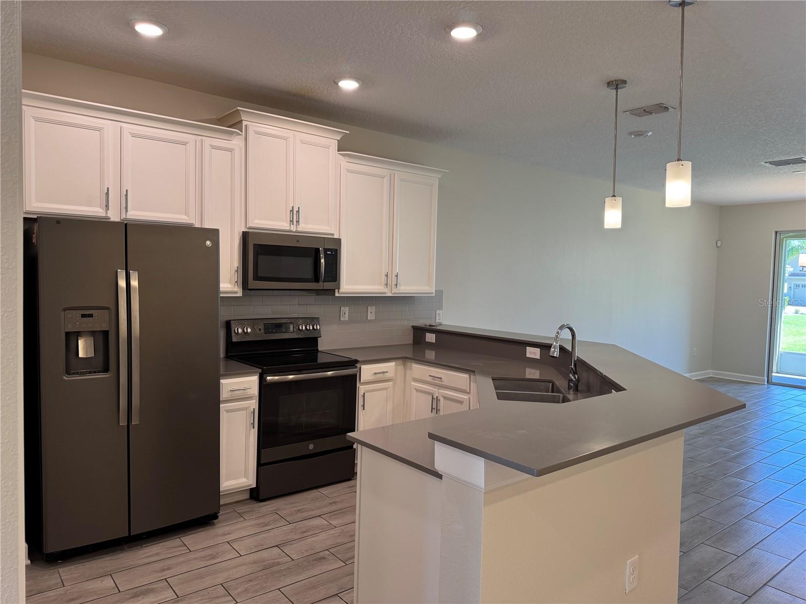 1077 QUAKER RIDGE LN, DAVENPORT, FL, 33896