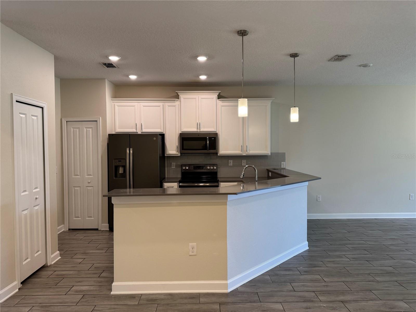1077 QUAKER RIDGE LN, DAVENPORT, FL, 33896