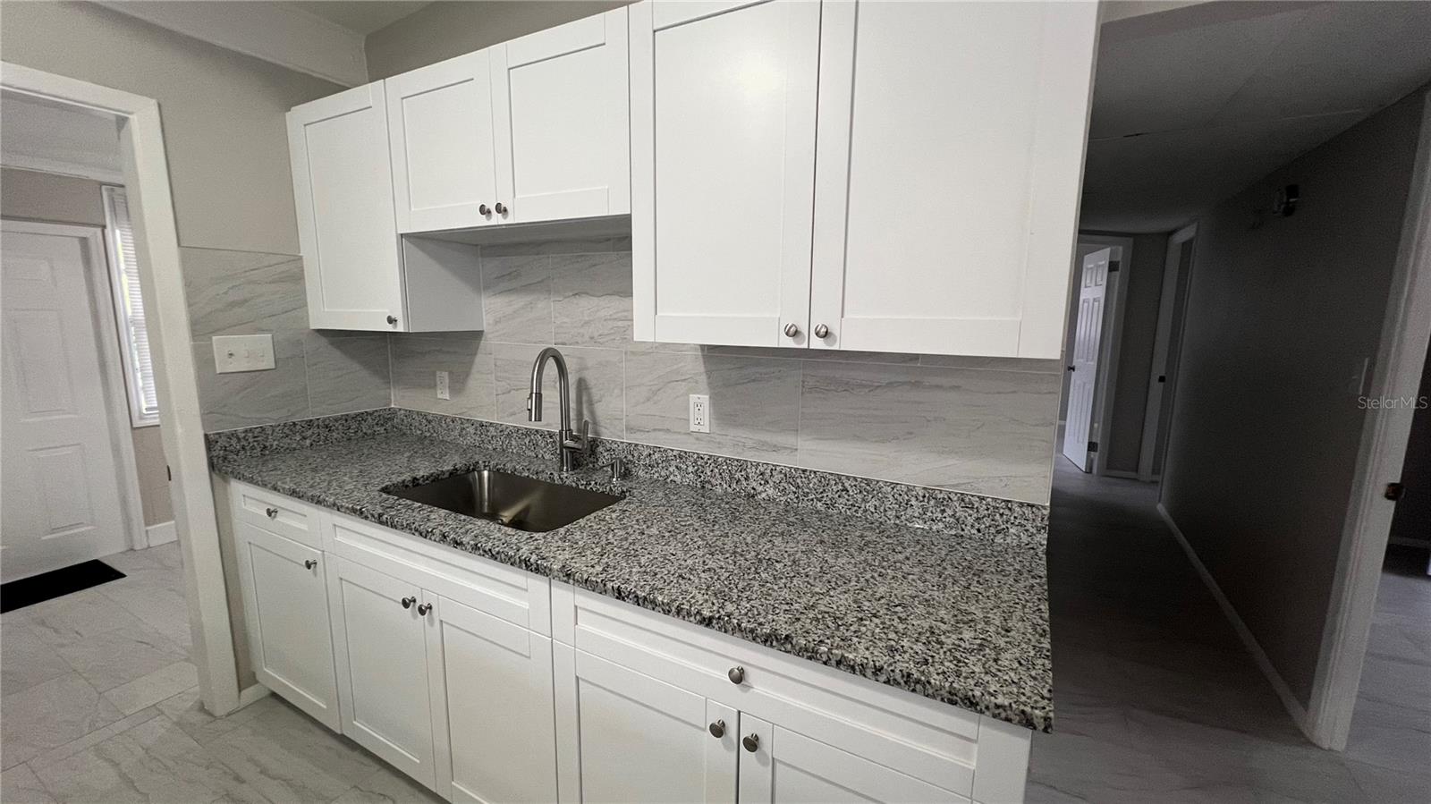 7815 RIDEIN RD, TAMPA, FL, 33619