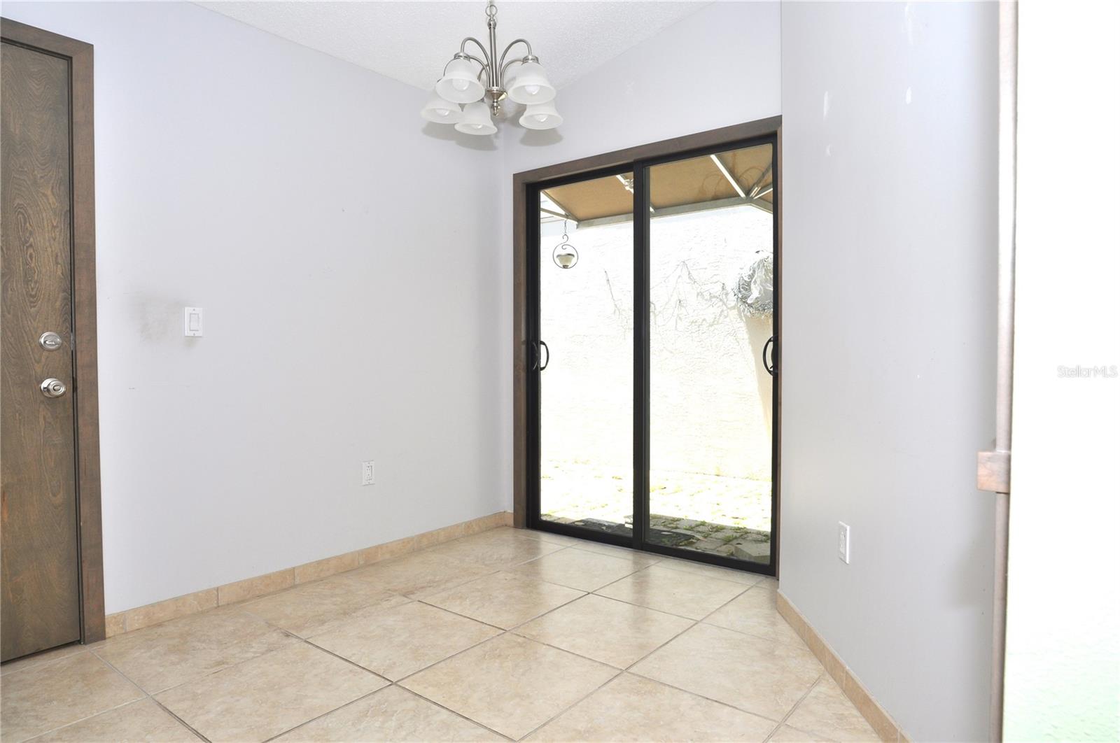 Kitchen dinette & entry to courtyard