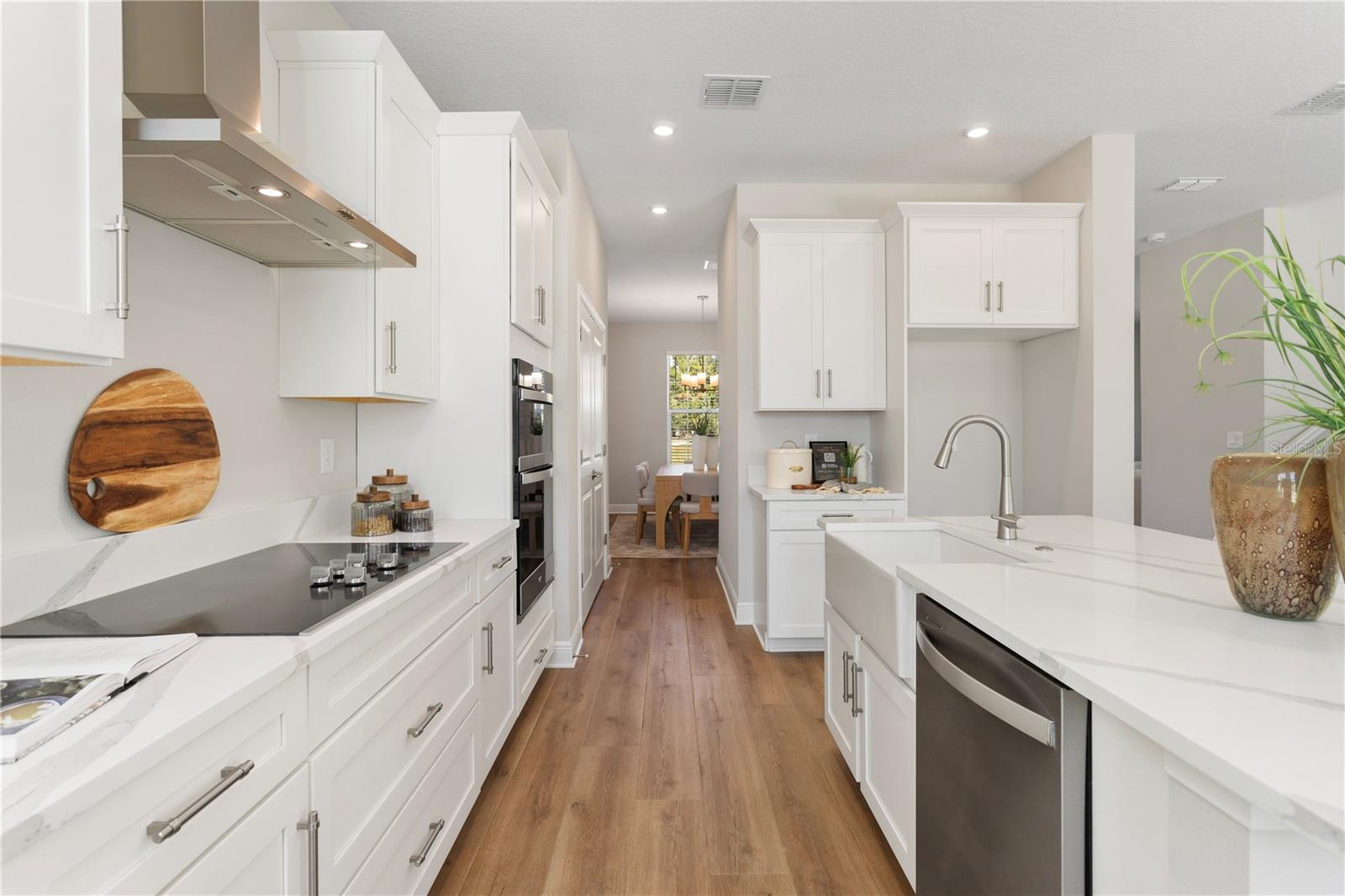 Kitchen connects to dining room and pantry