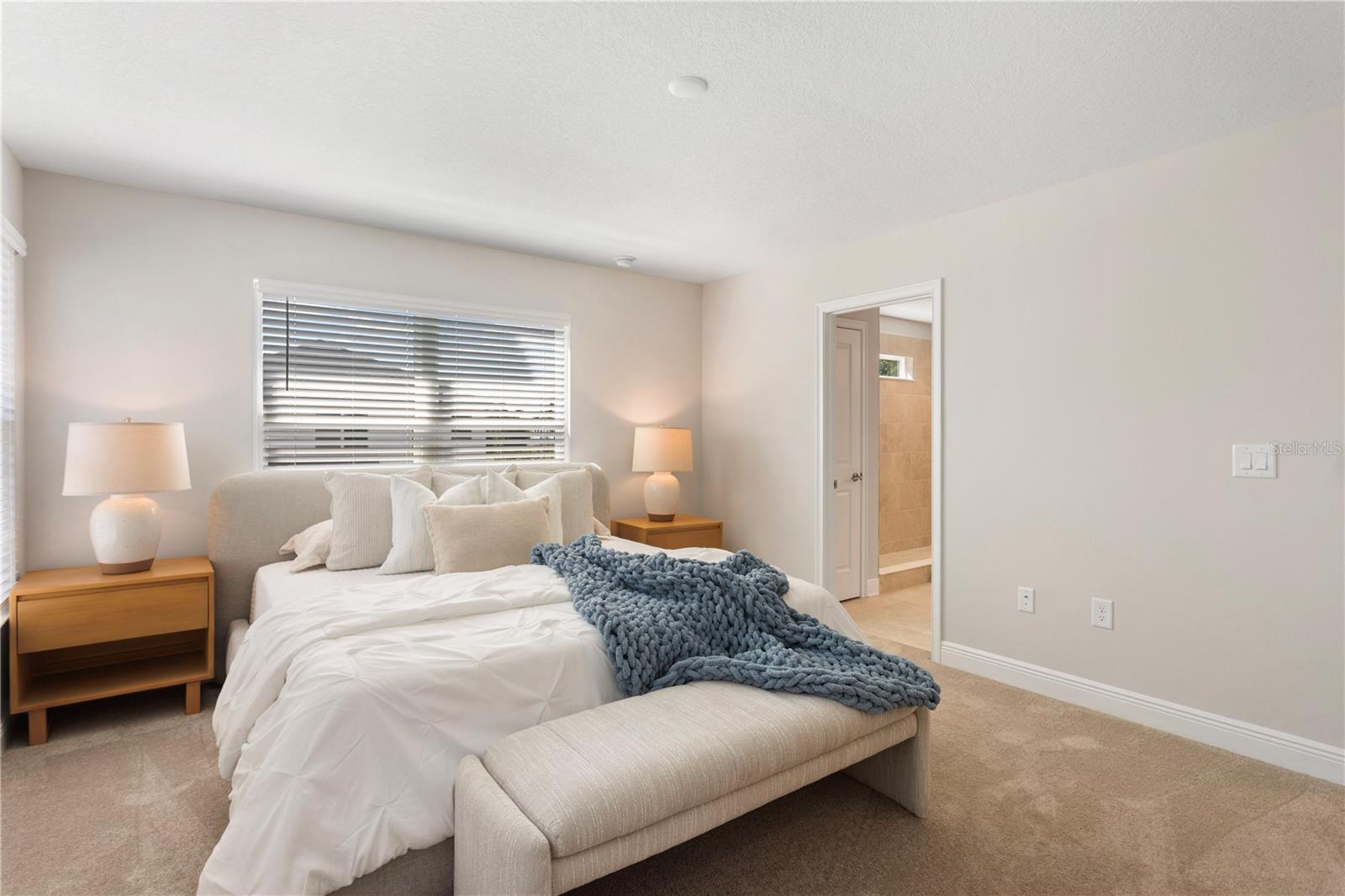 Primary bedroom fits a King-sized bed