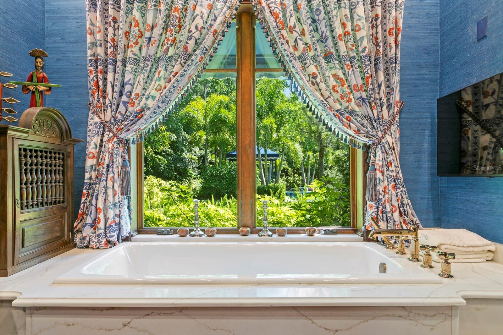 Take a deep breath while lounging in your private sanctuary, complete with a sumptuous tub that beckons for long, leisurely soaks.