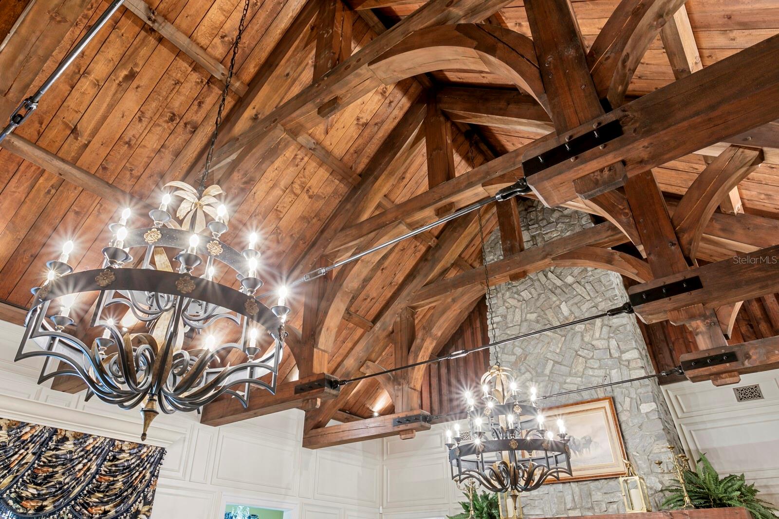 The majestic wooden beams above echo an architectural artistry that transforms this space into a sanctuary of style.