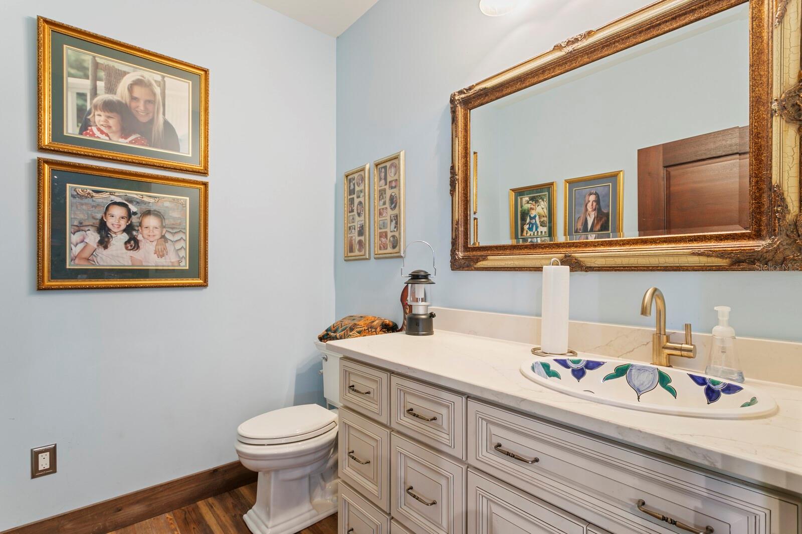 Step into this charming bathroom where classic elegance meets everyday convenience.