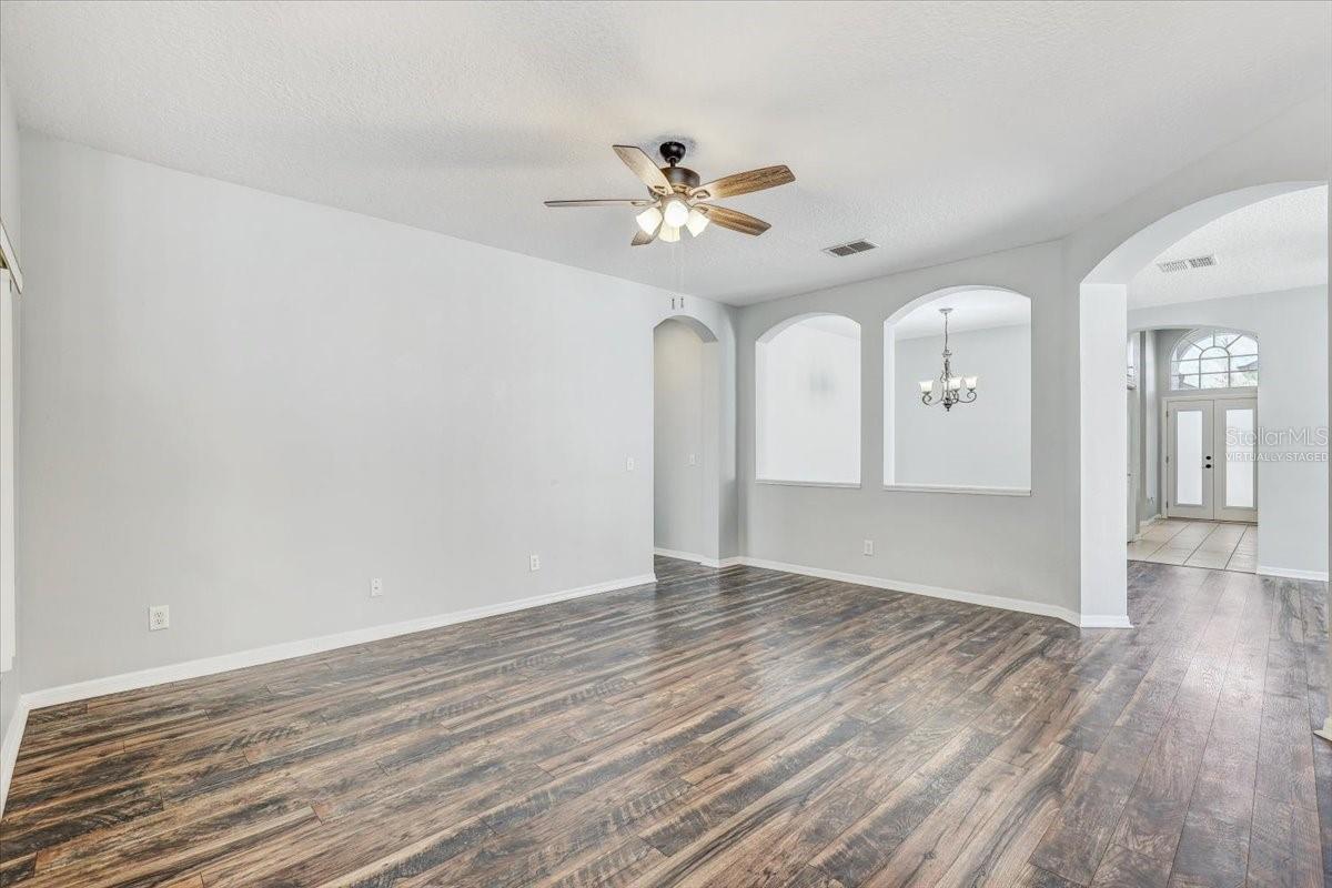 Family room with front door entry visible