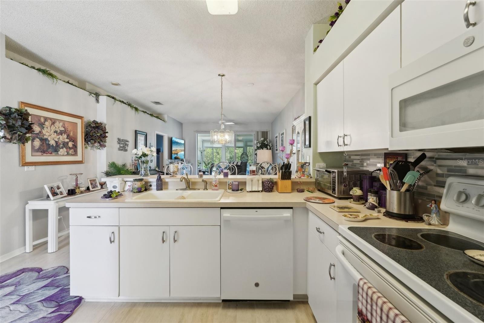 767 TREMONT GREENS LN #64, SUN CITY CENTER, FL, 33573