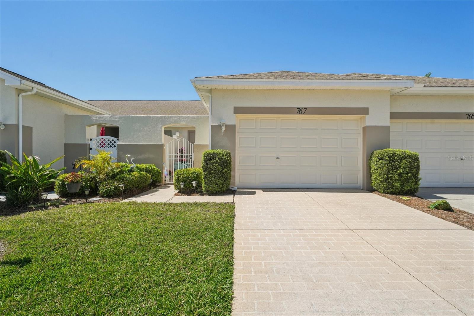 767 TREMONT GREENS LN #64, SUN CITY CENTER, FL, 33573