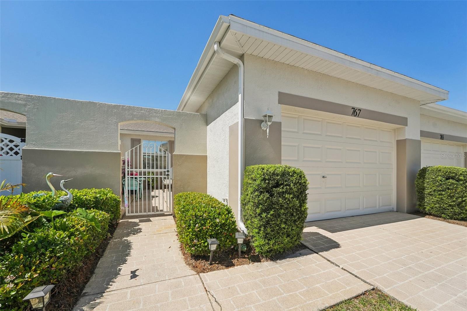 767 TREMONT GREENS LN #64, SUN CITY CENTER, FL, 33573