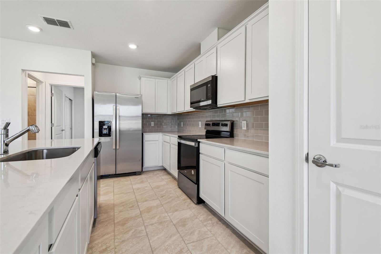 9058 RALLY SPRING LOOP, WESLEY CHAPEL, FL, 33545