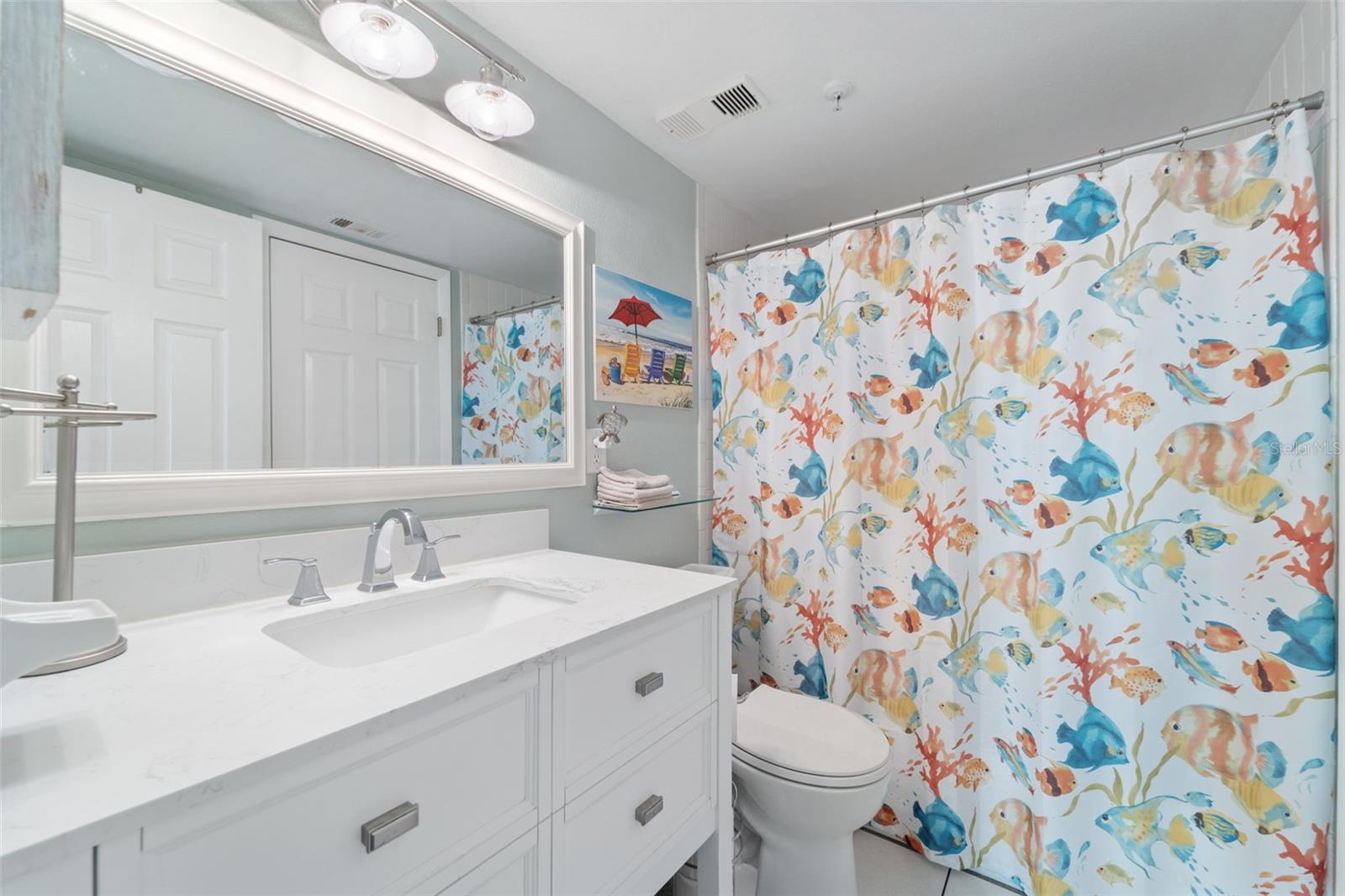 Bathroom has tub/shower combo.