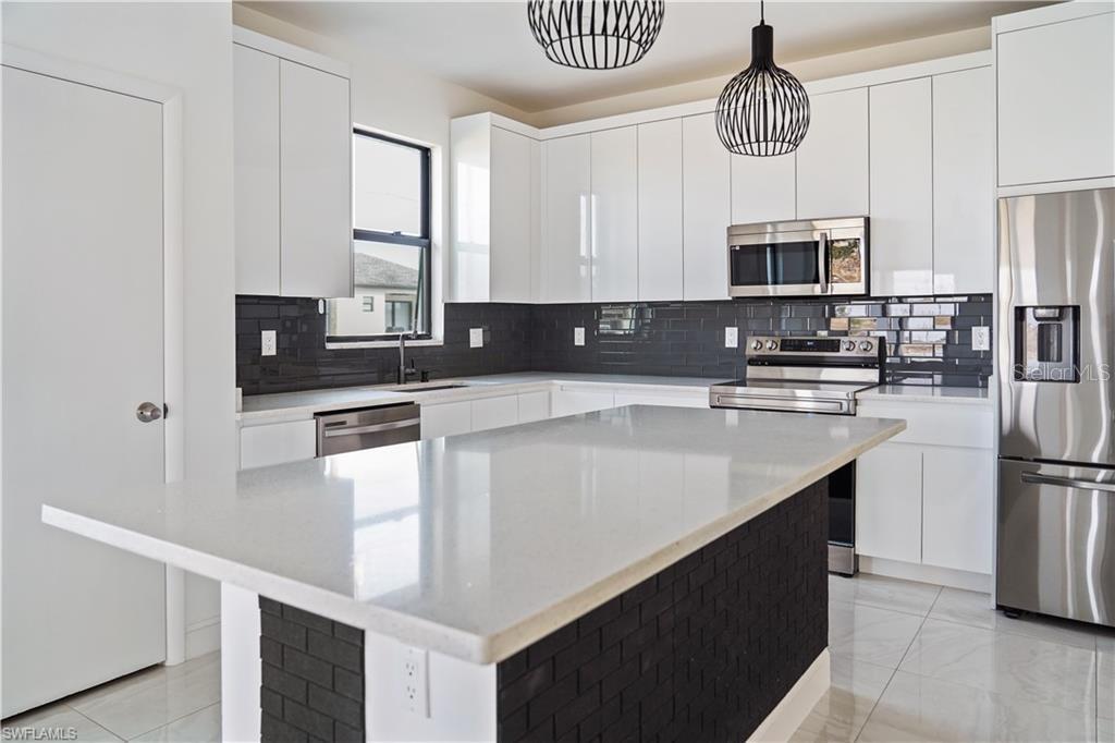 1909 NW 1ST AVE, CAPE CORAL, FL, 33993