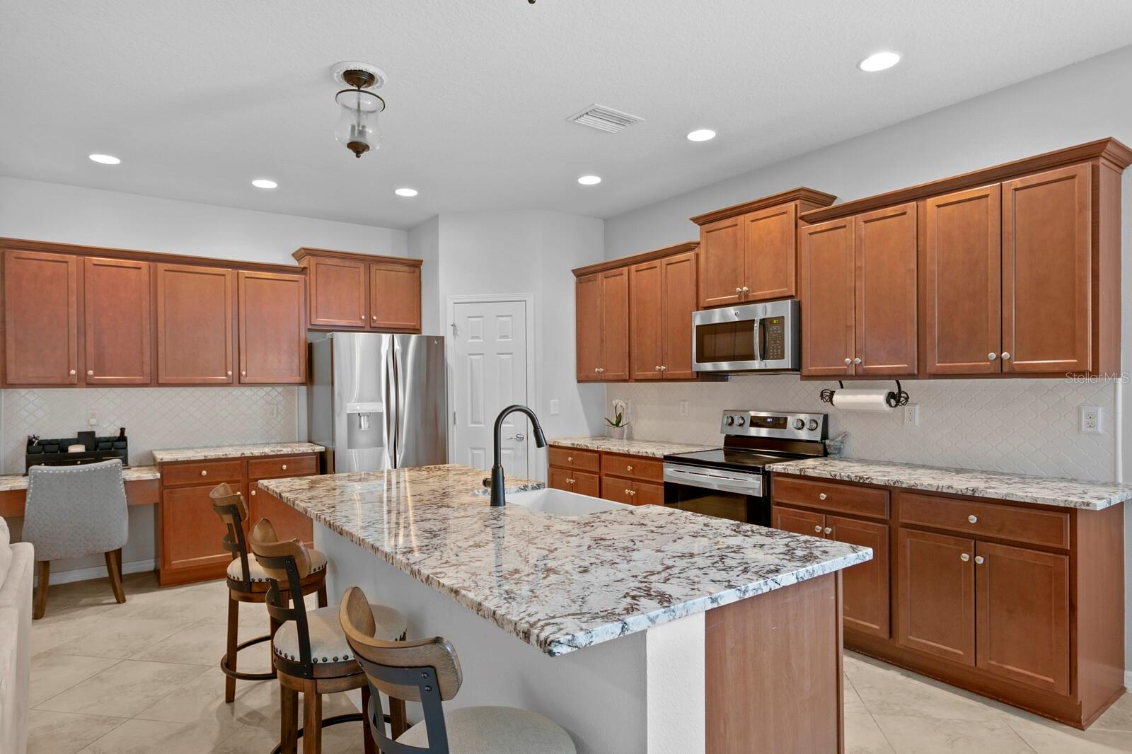 Upgraded kitchen with a large center island