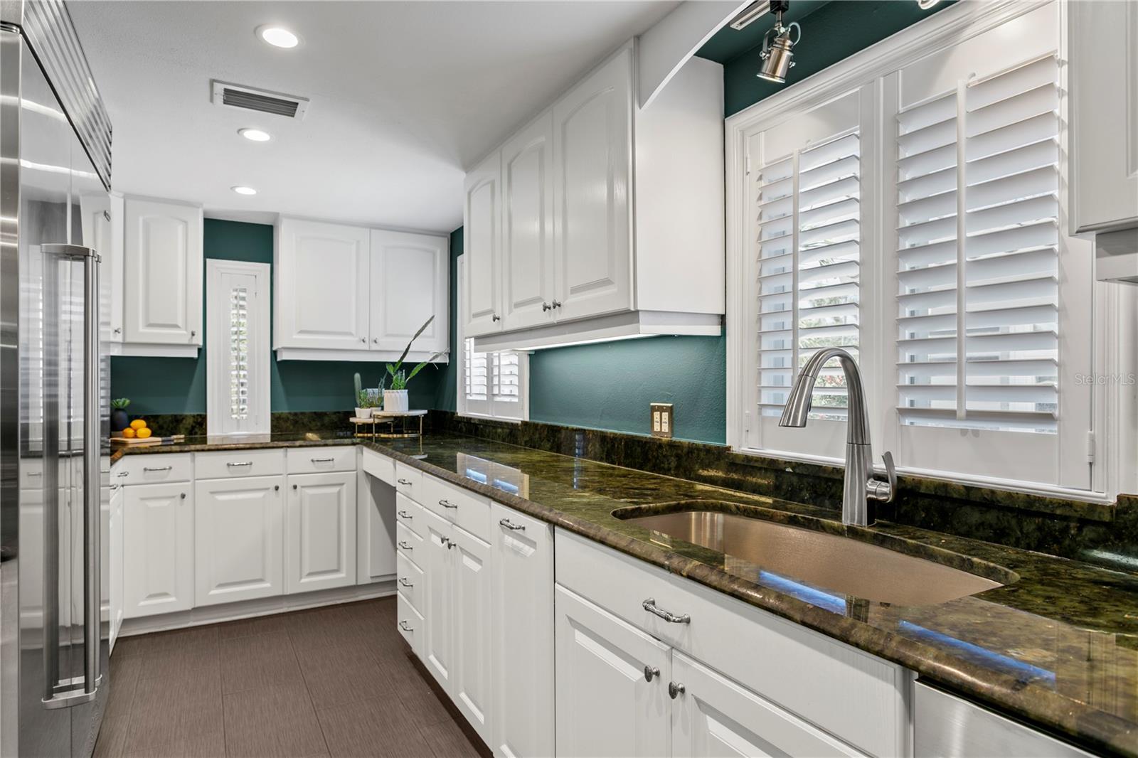 Kitchen with a Sub-zero refrigerator.