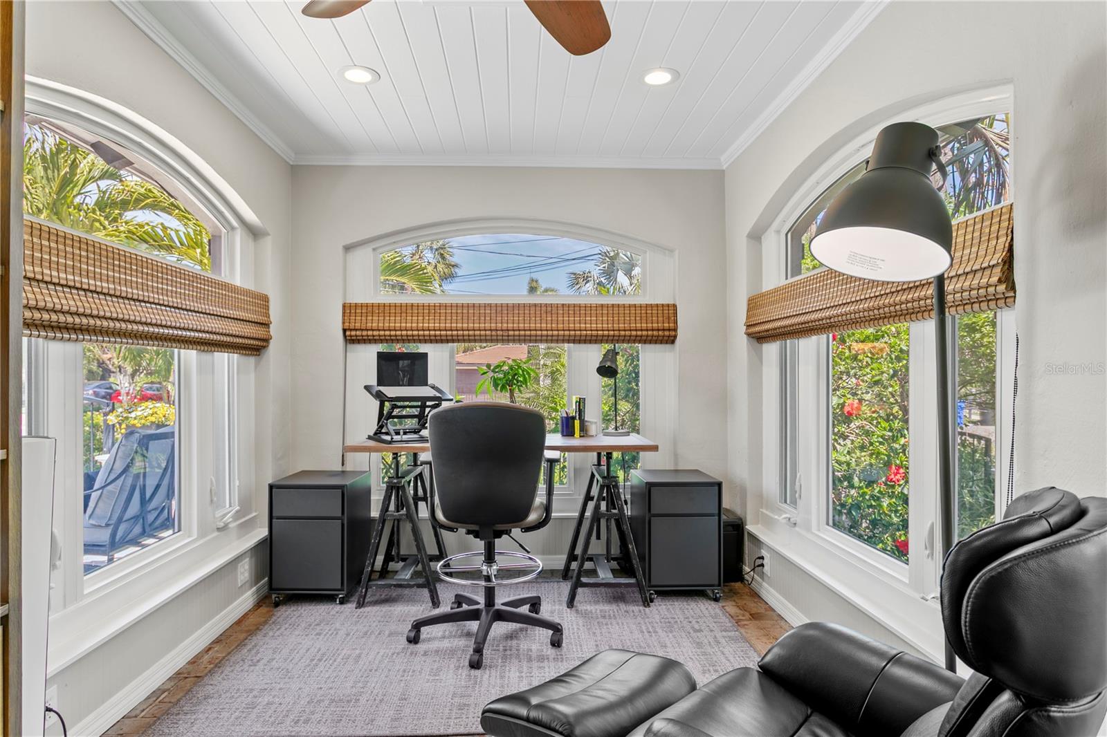 This home Office can also be used as a workout space or sunroom.