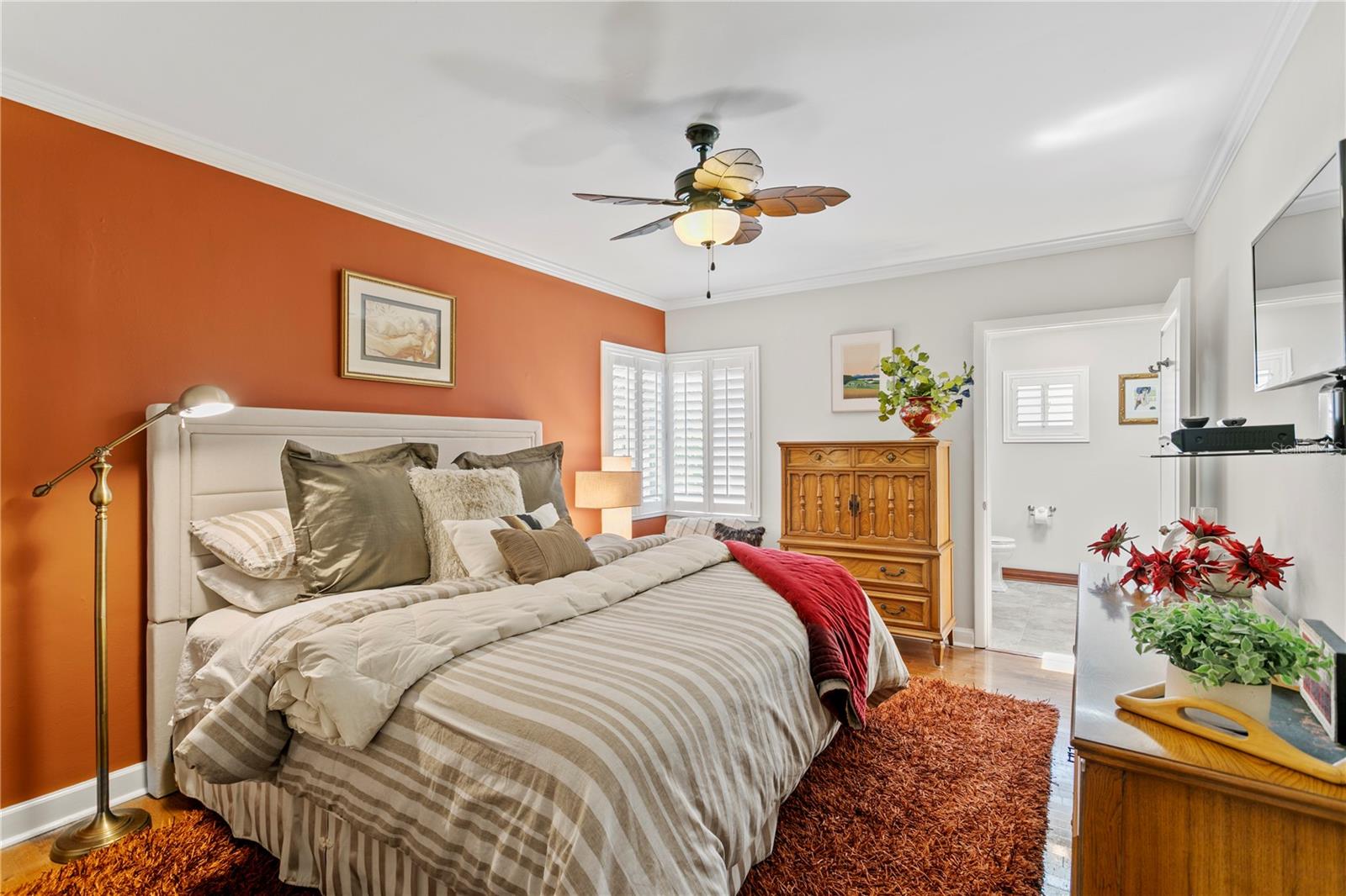 The guest bedroom has a spacious walk-in closet.