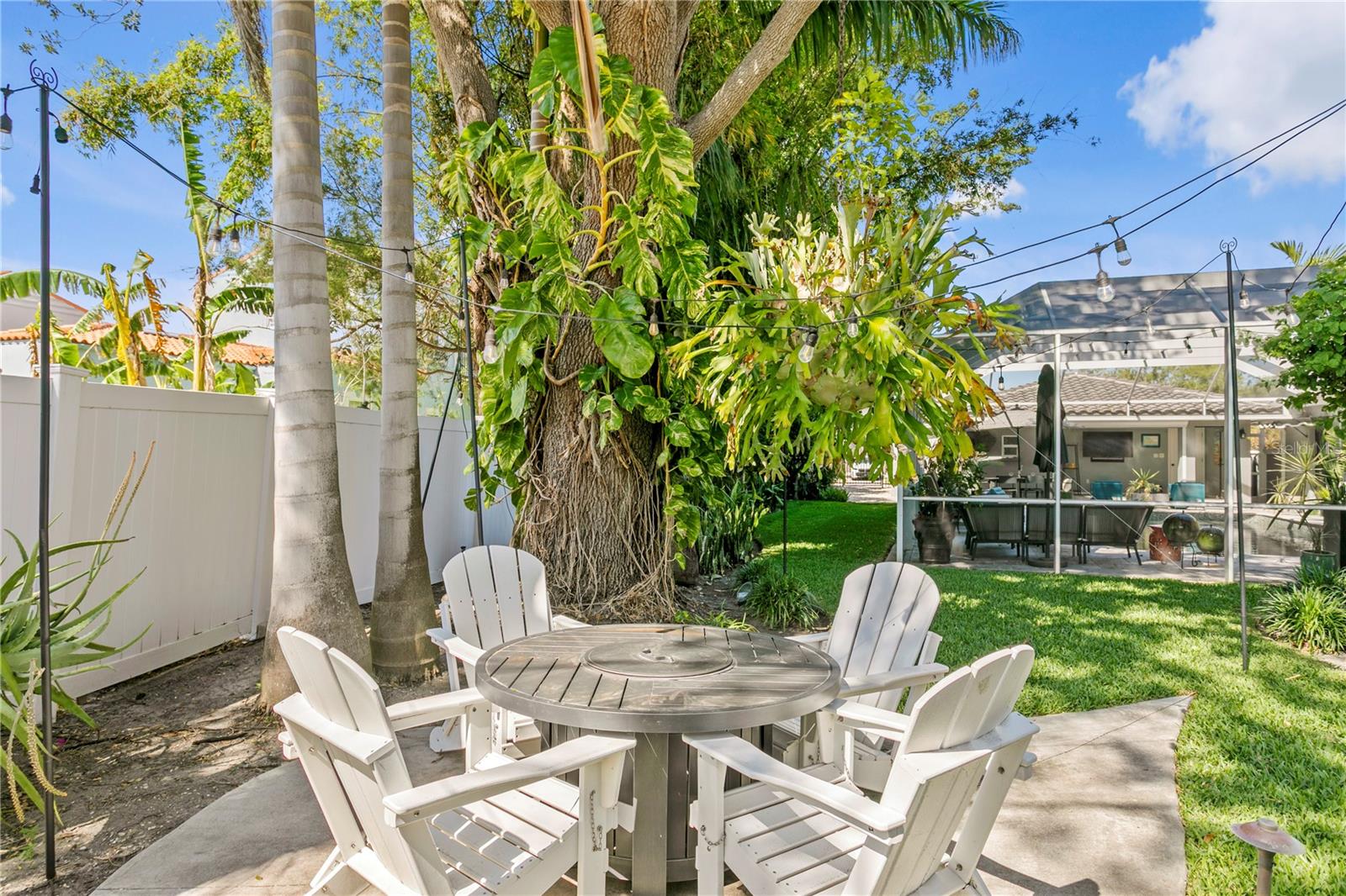 A cozy fire pit completes this outdoor entertainment space!