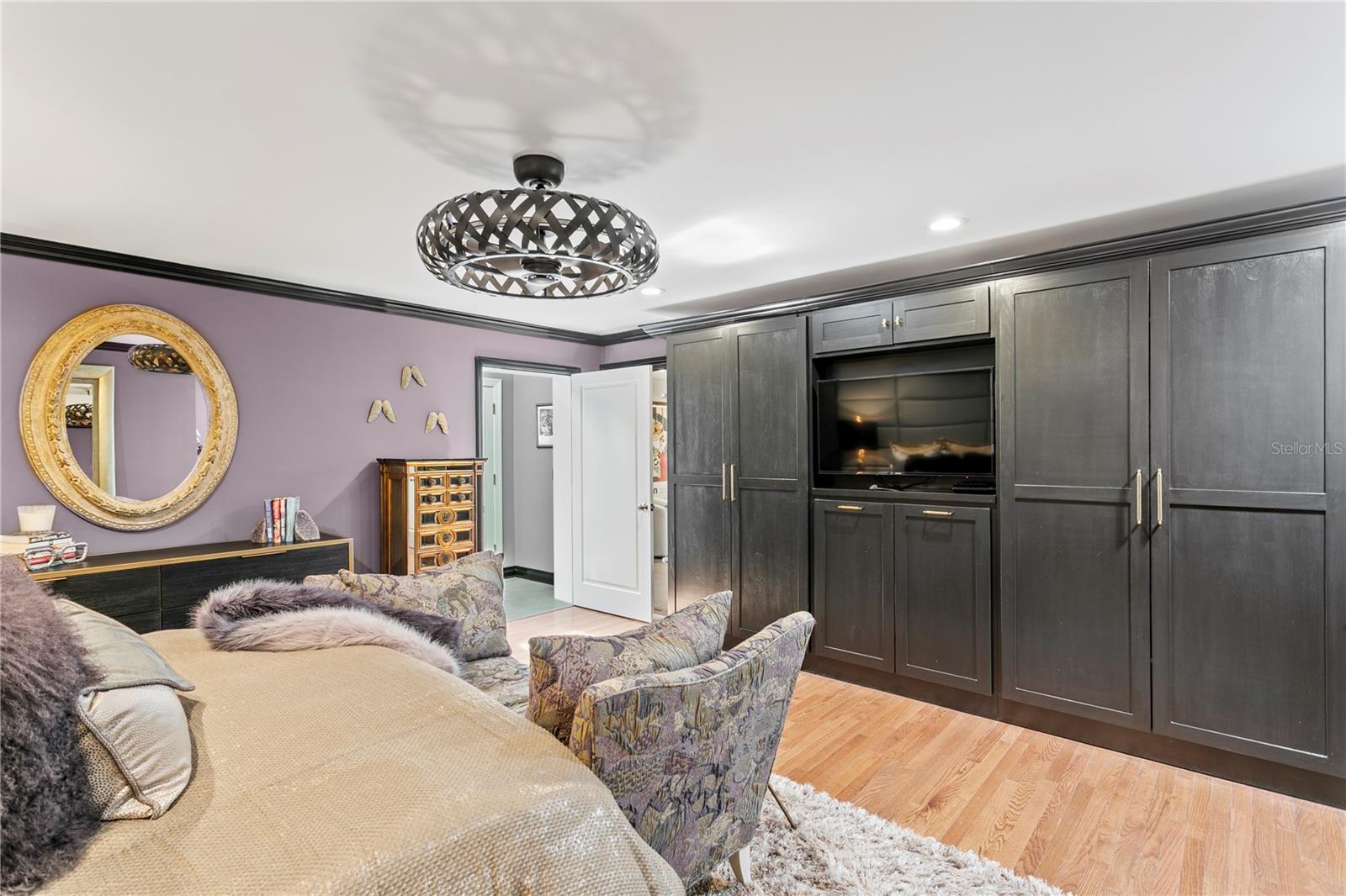 Primary Bedroom with beautiful wood floors.