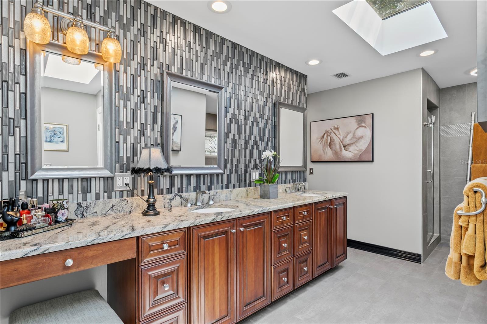 The Primary Bathroom has a separate shower, tub and walk-in closet.